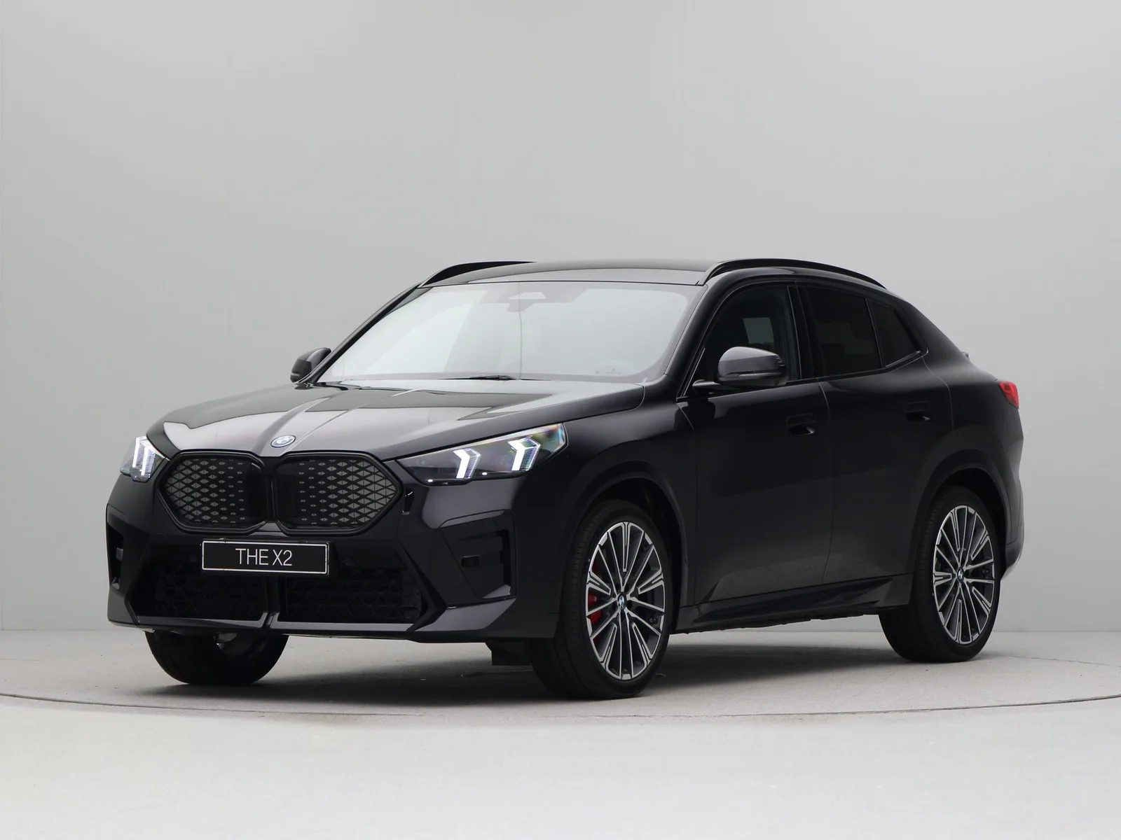 BMW iX2 (2026) — foto 1