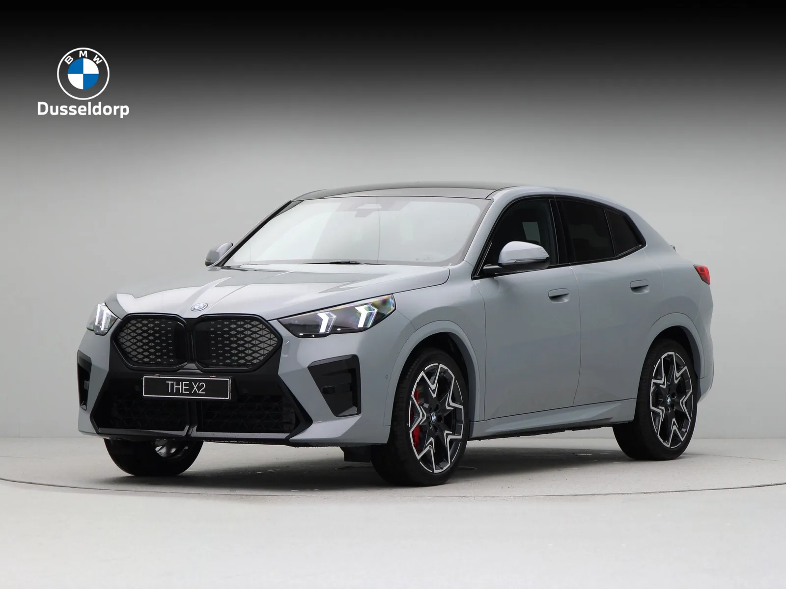 BMW iX2 (2026) — foto 1