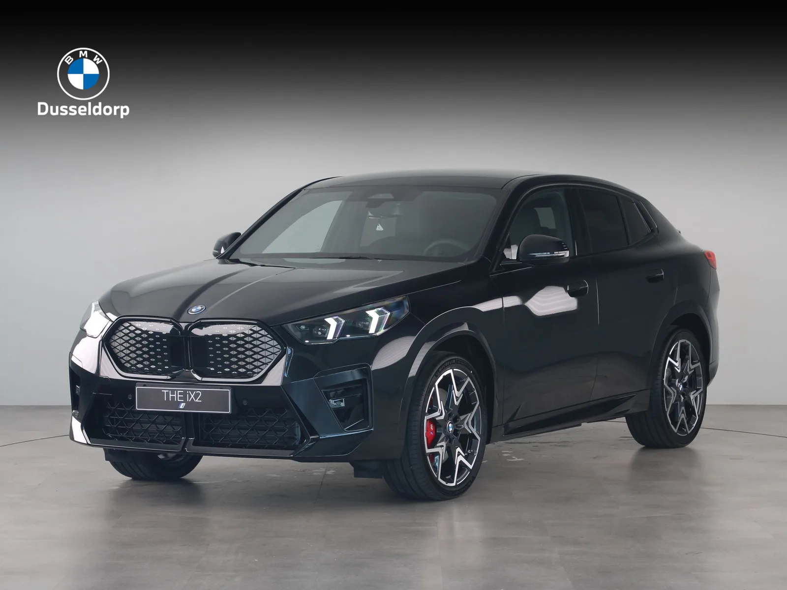 BMW iX2 (2026) — foto 1