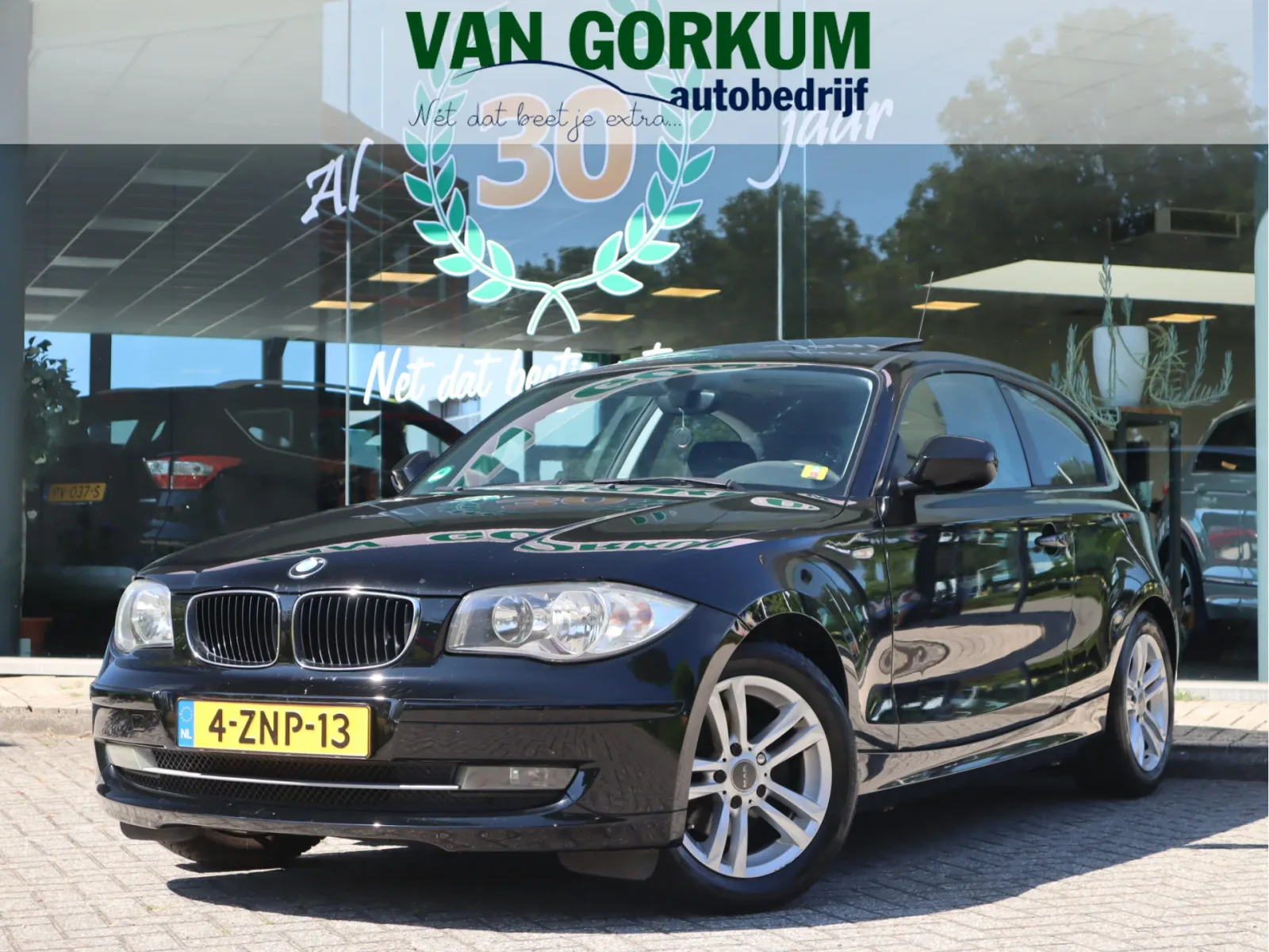 BMW 1-Serie (2010) — foto 1