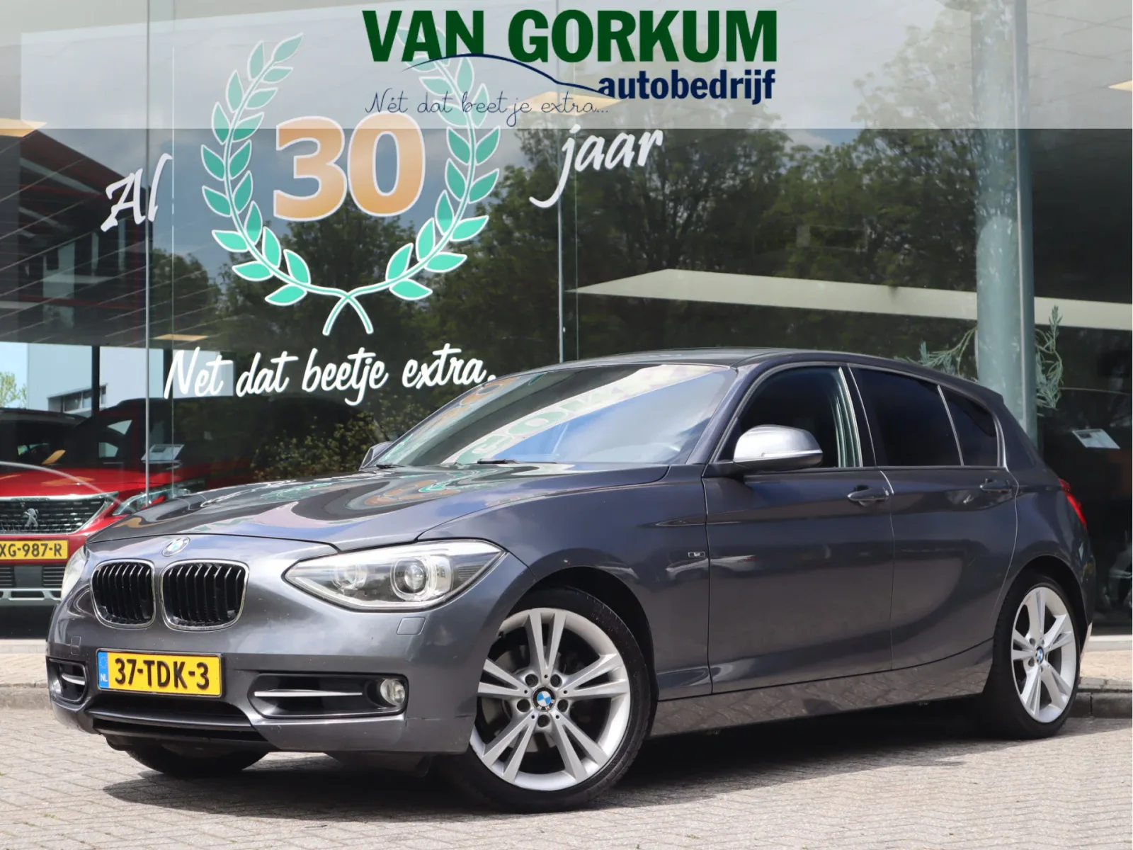 BMW 1-Serie (2012) — foto 1