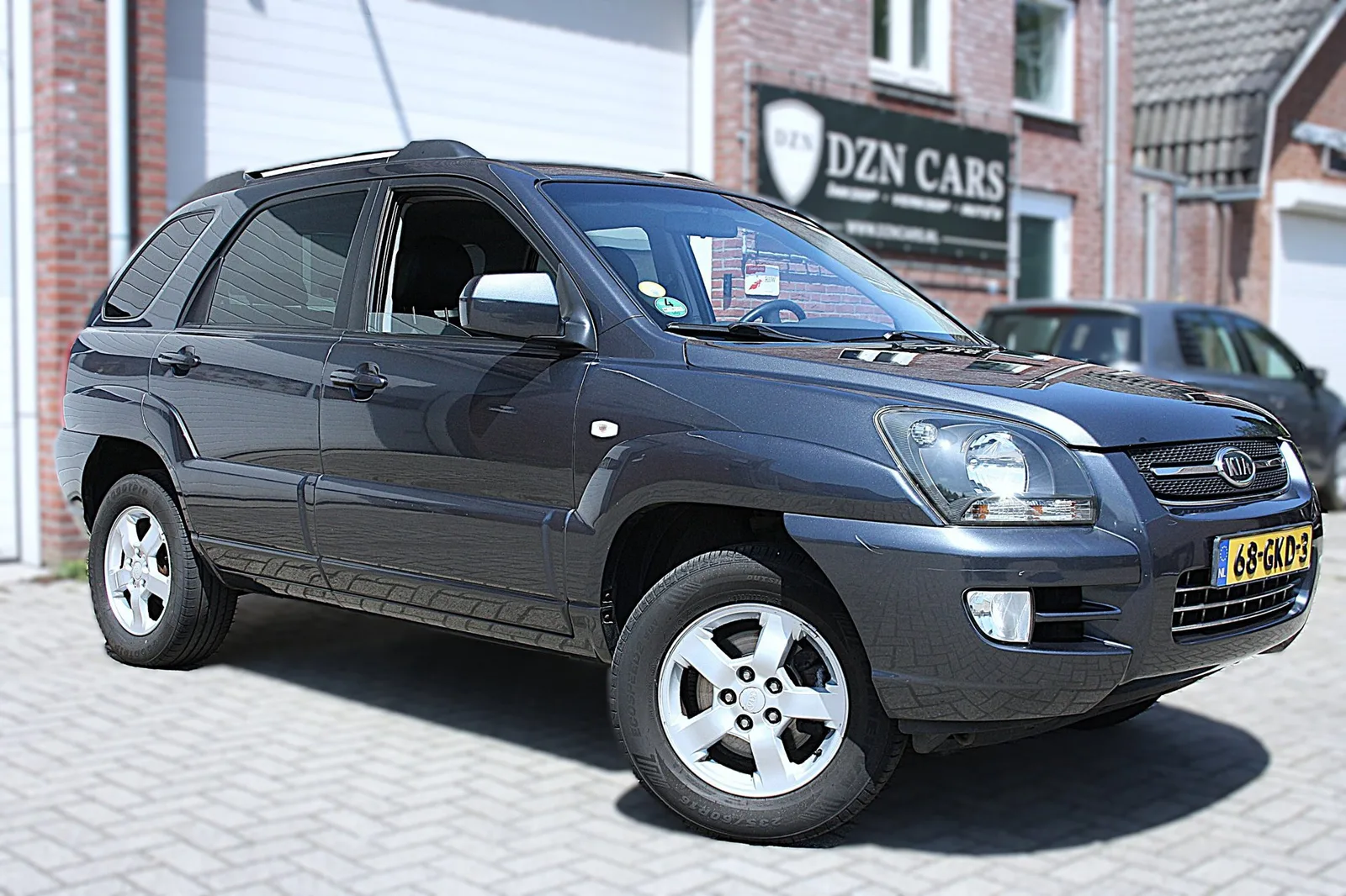 Kia Sportage (2009) — foto 1