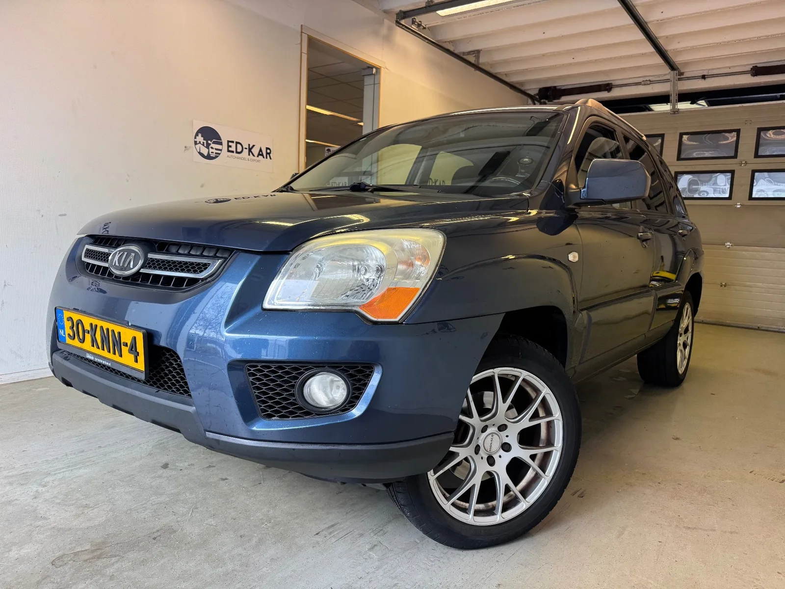 Kia Sportage (2010) — foto 1