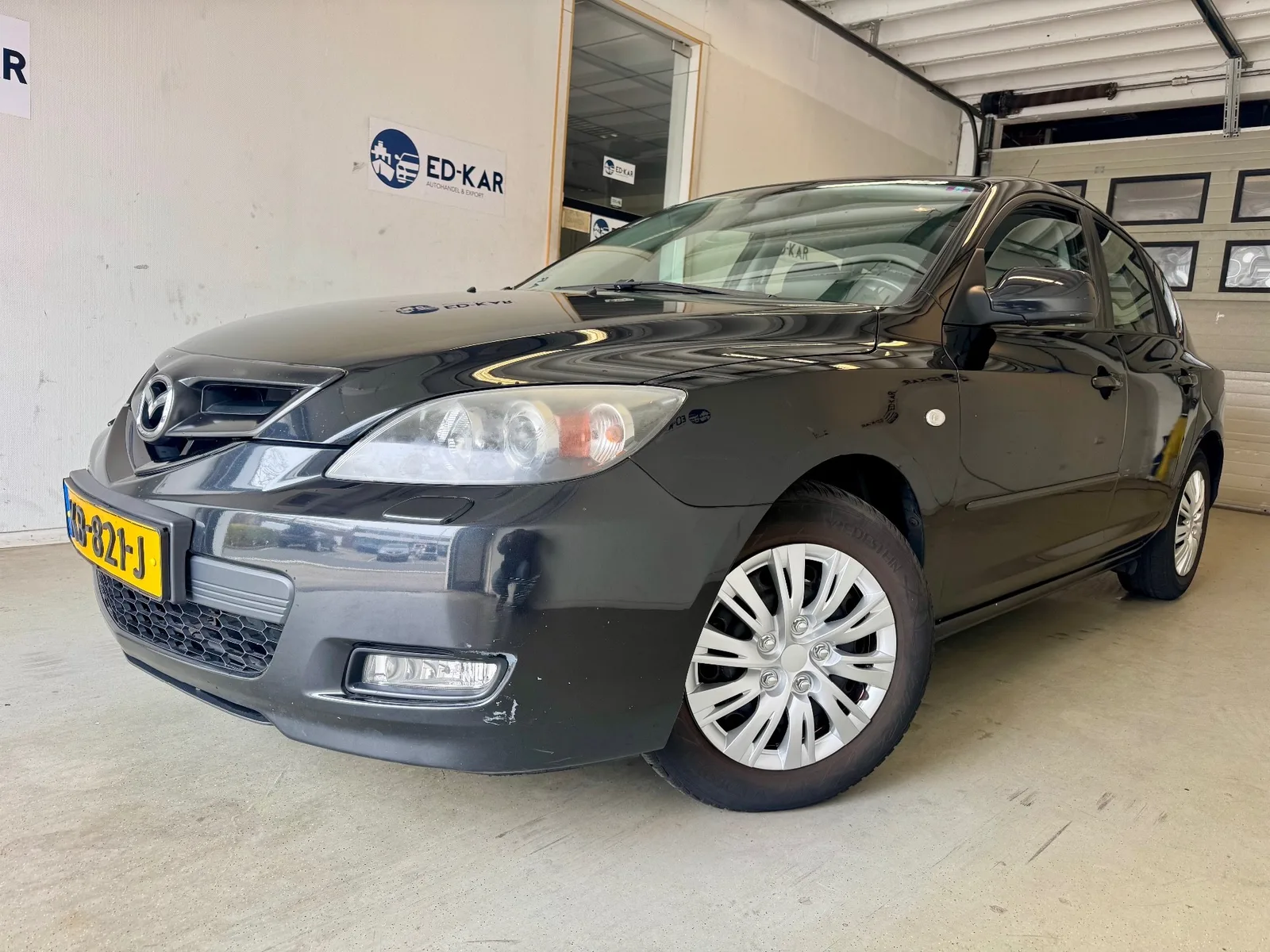 Mazda 3 (2009) — foto 1