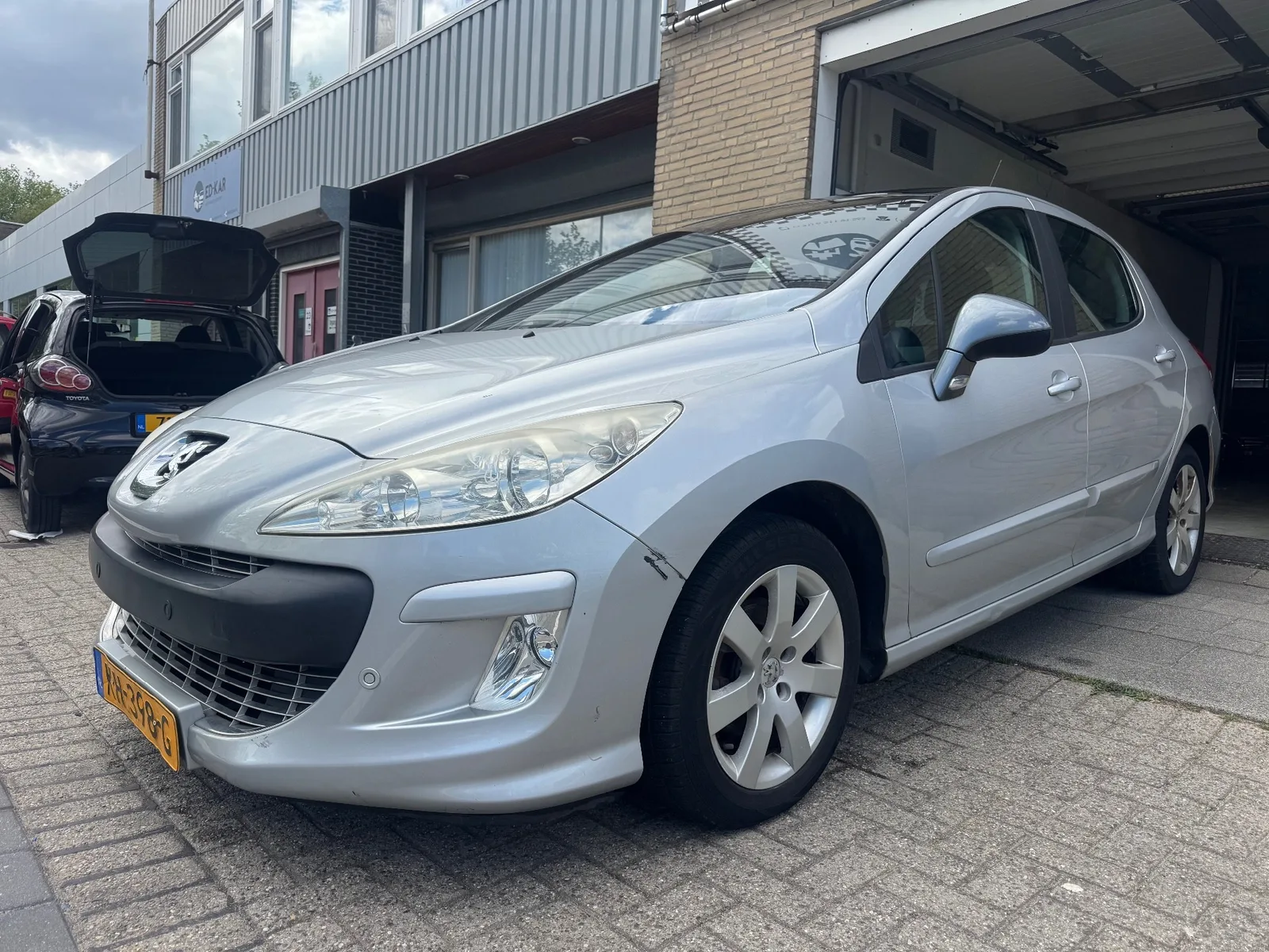Peugeot 308 (2009) — foto 1