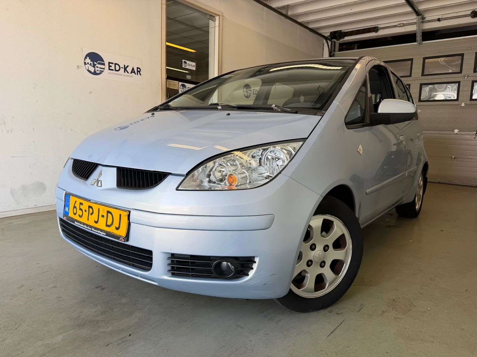 Mitsubishi Colt (2004) — foto 1