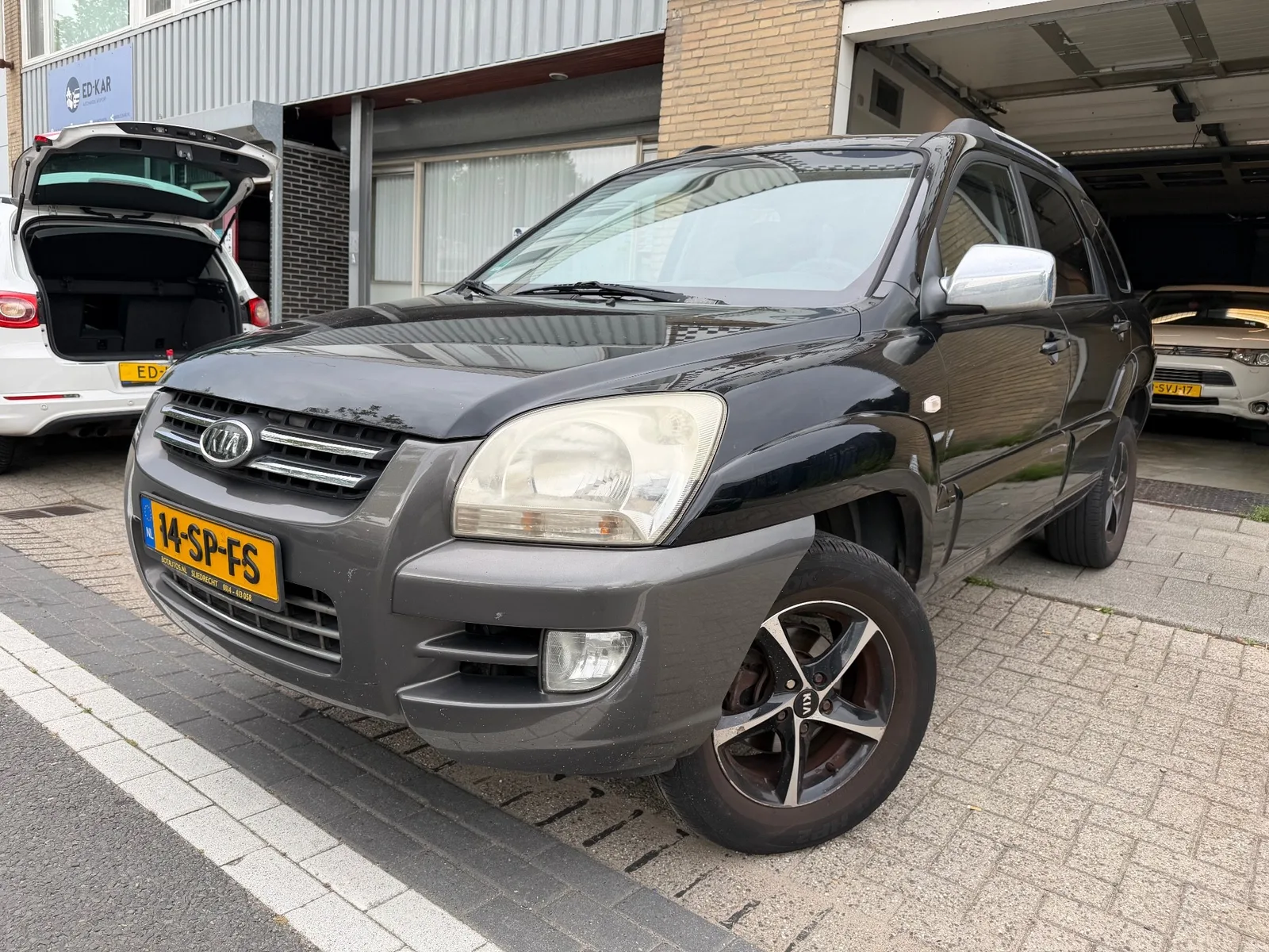 Kia Sportage (2006) — foto 1