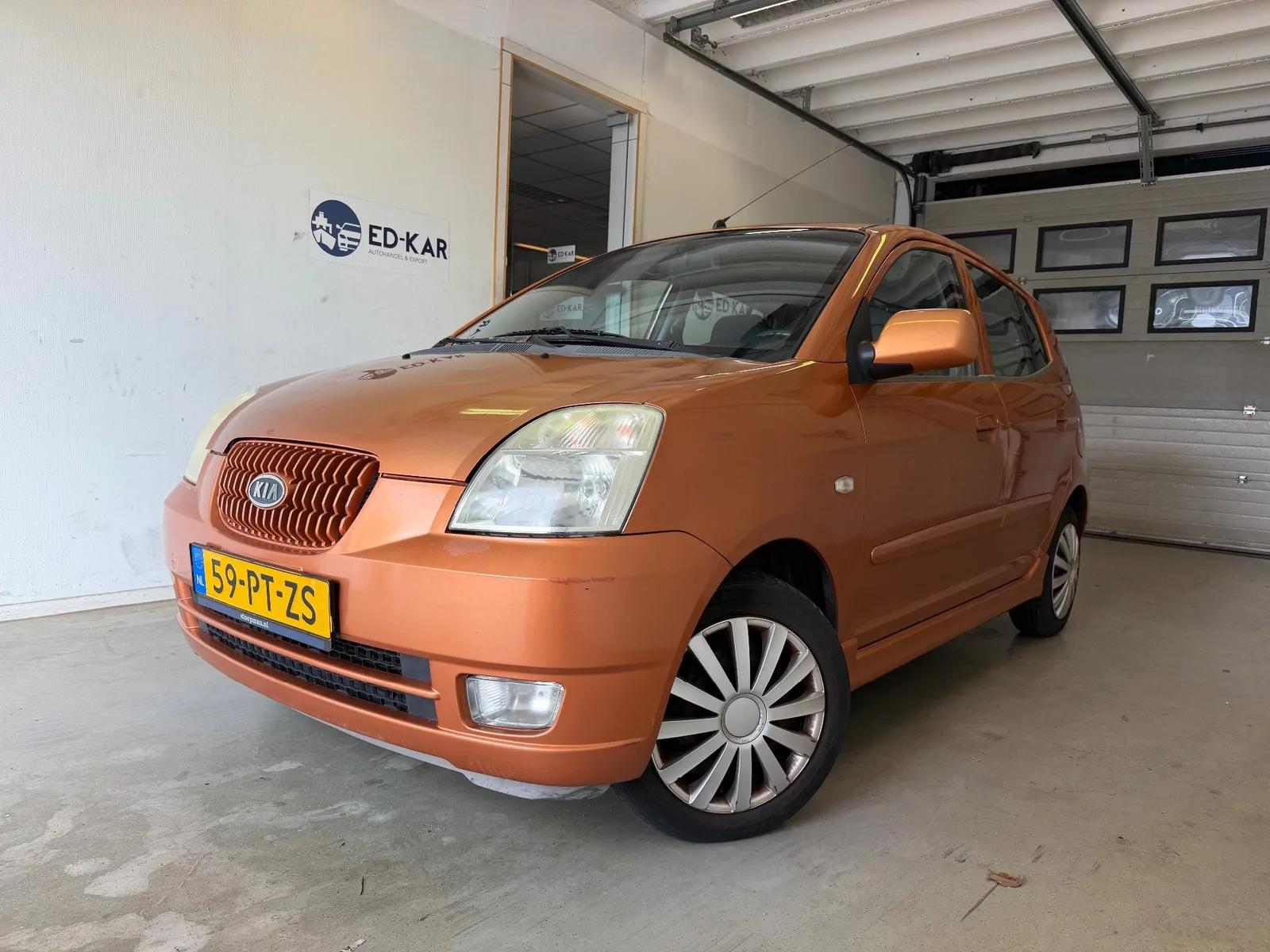 Kia Picanto (2004) — foto 1