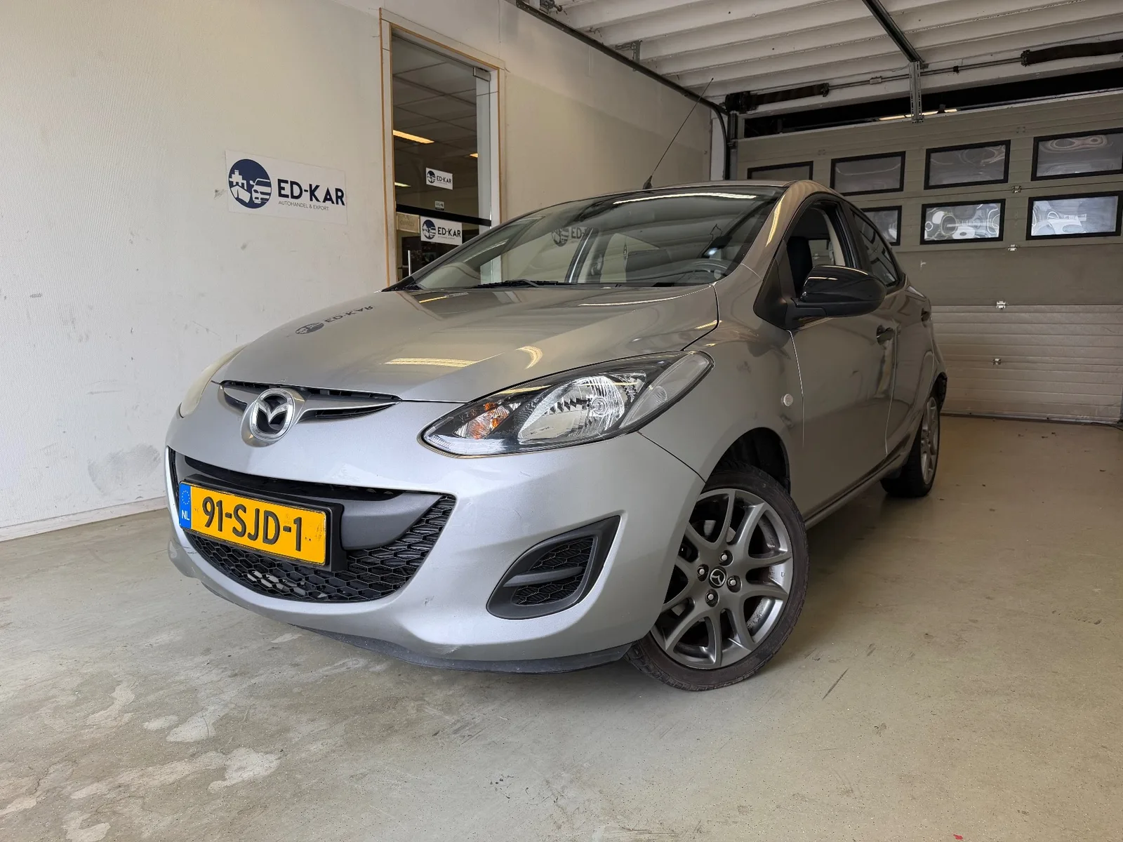 Mazda 2 (2011) — foto 1