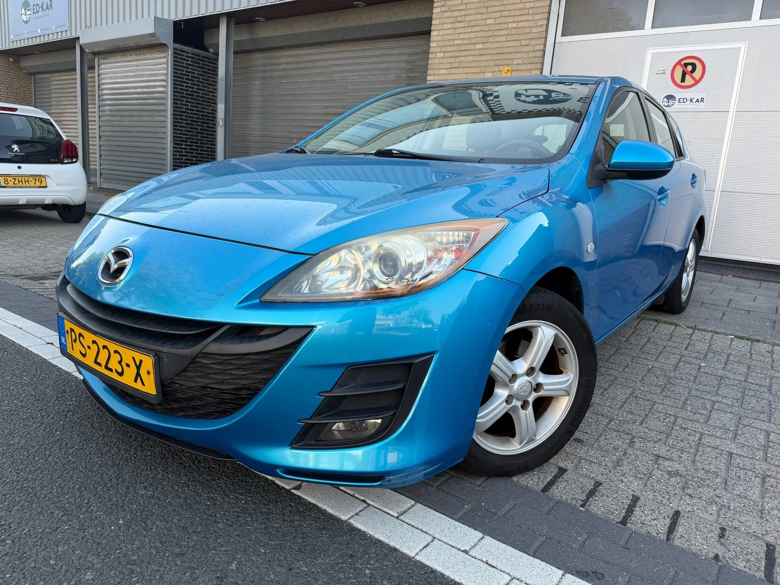 Mazda 3 (2009) — foto 1