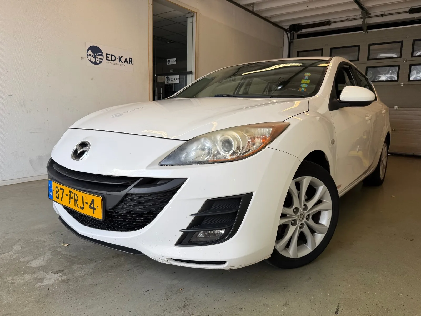 Mazda 3 (2011) — foto 1