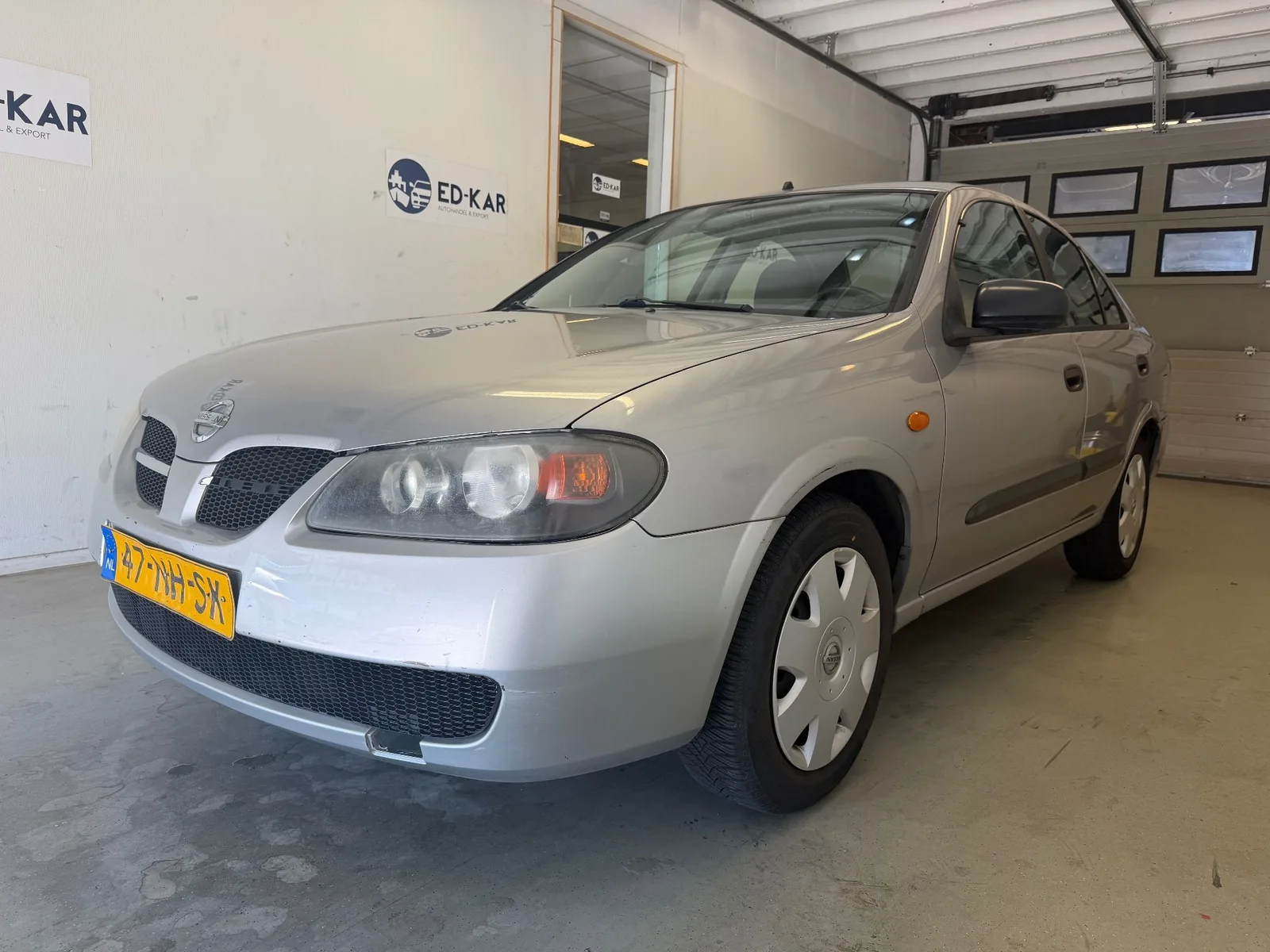 Nissan ALMERA (2003) — foto 1