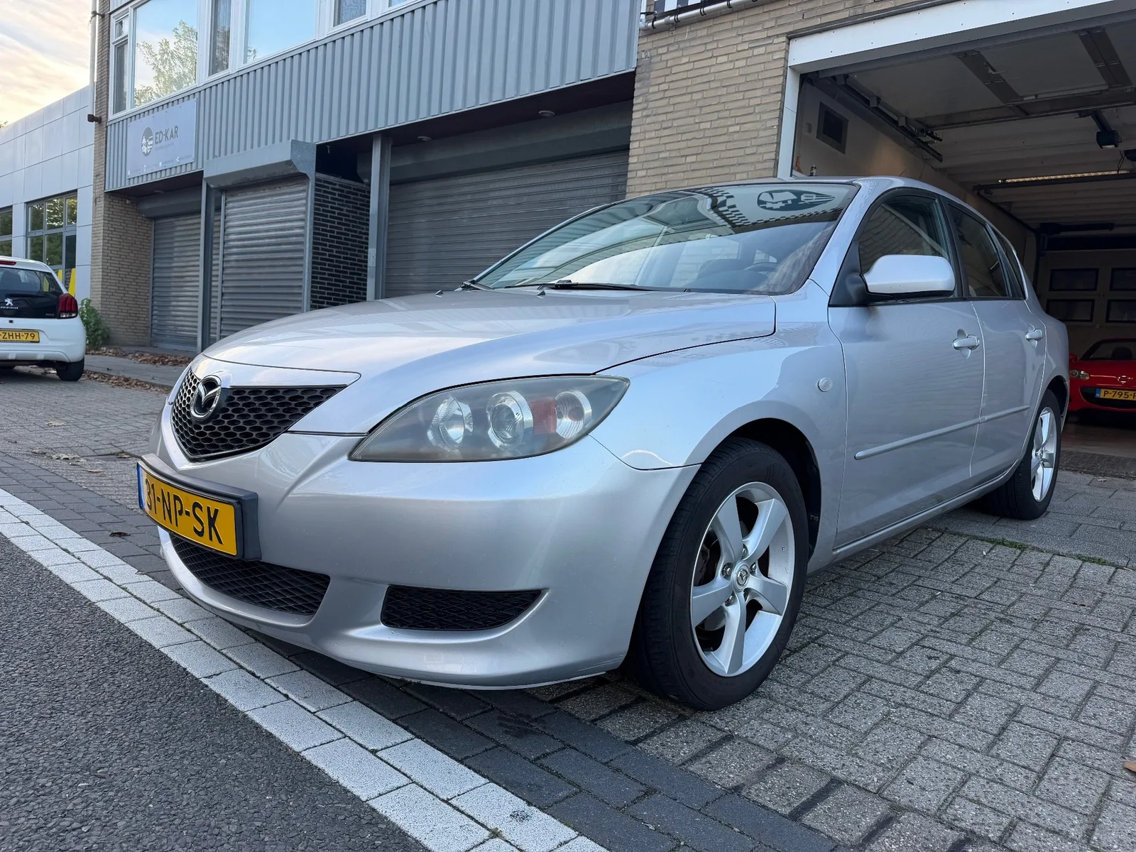 Mazda 3 (2004) — foto 1