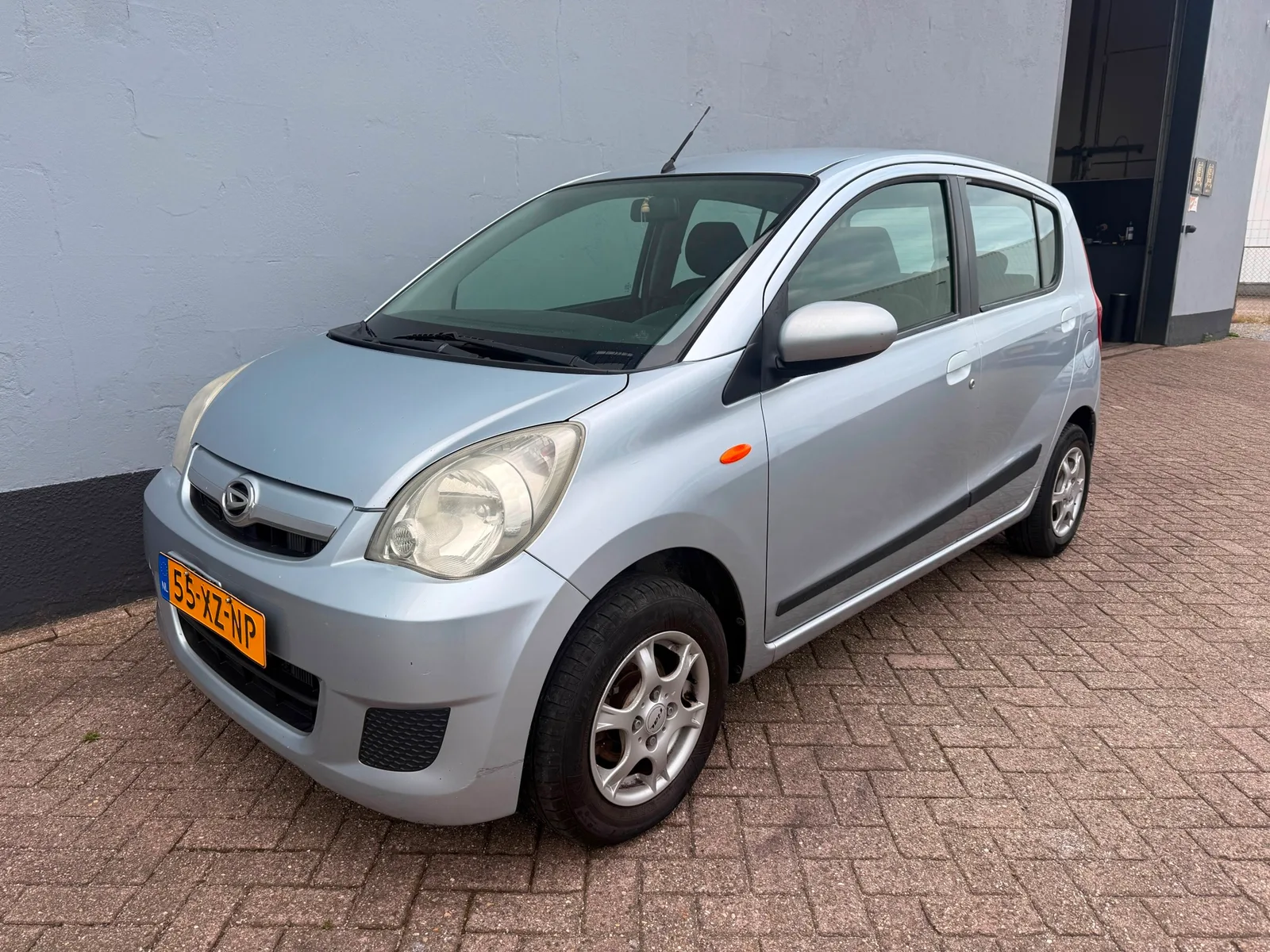 Daihatsu Cuore (2007) — foto 1