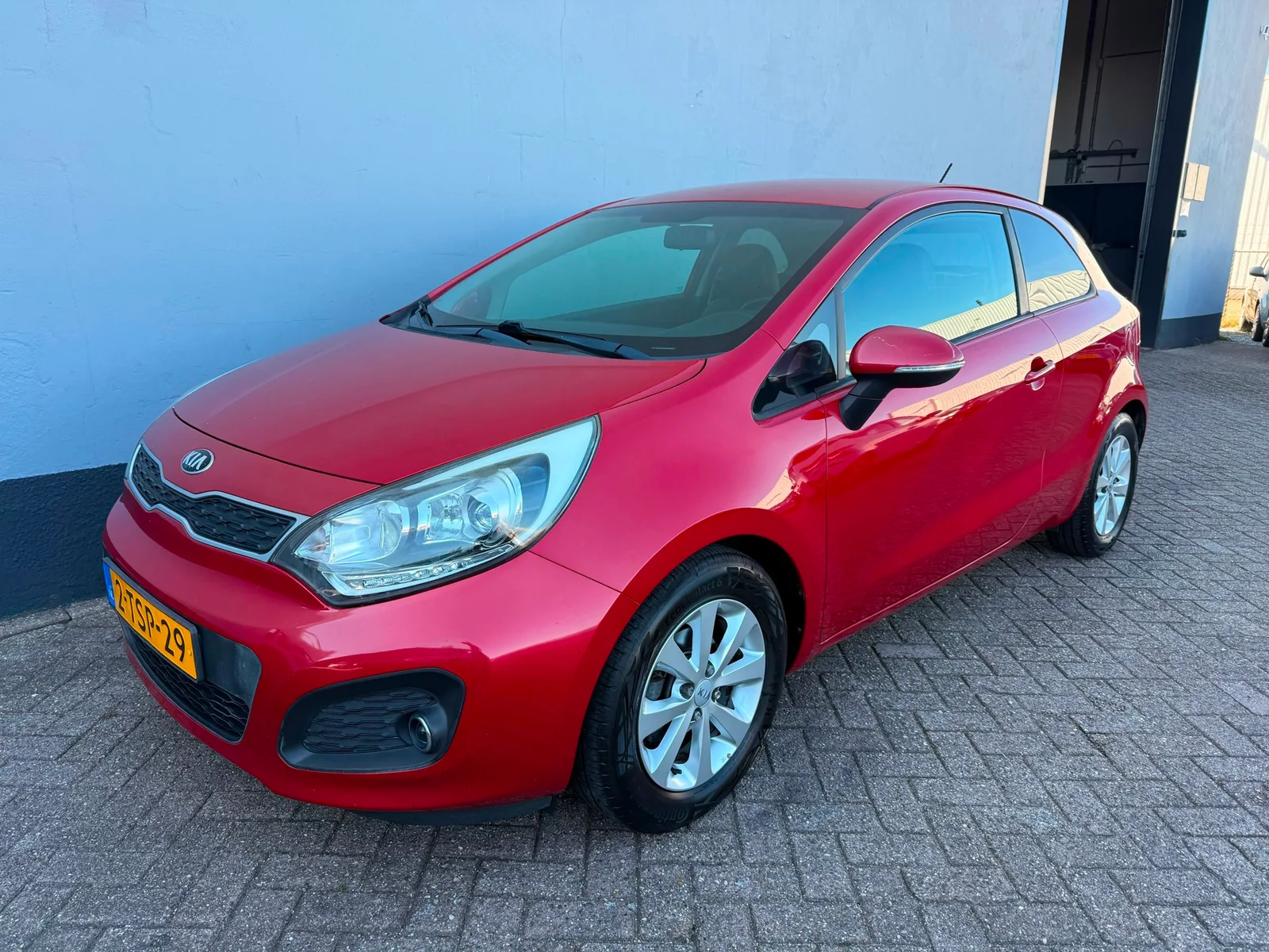 Kia Rio (2014) — foto 1
