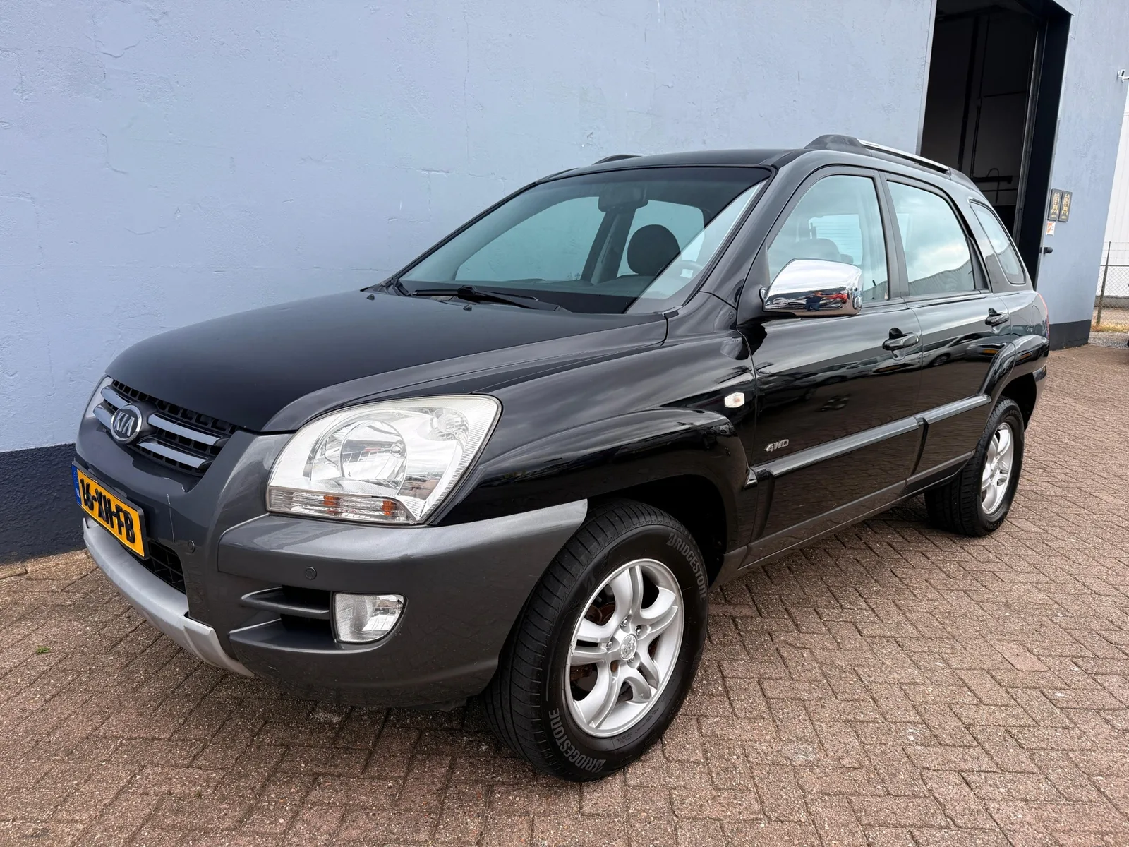 Kia Sportage (2007) — foto 1