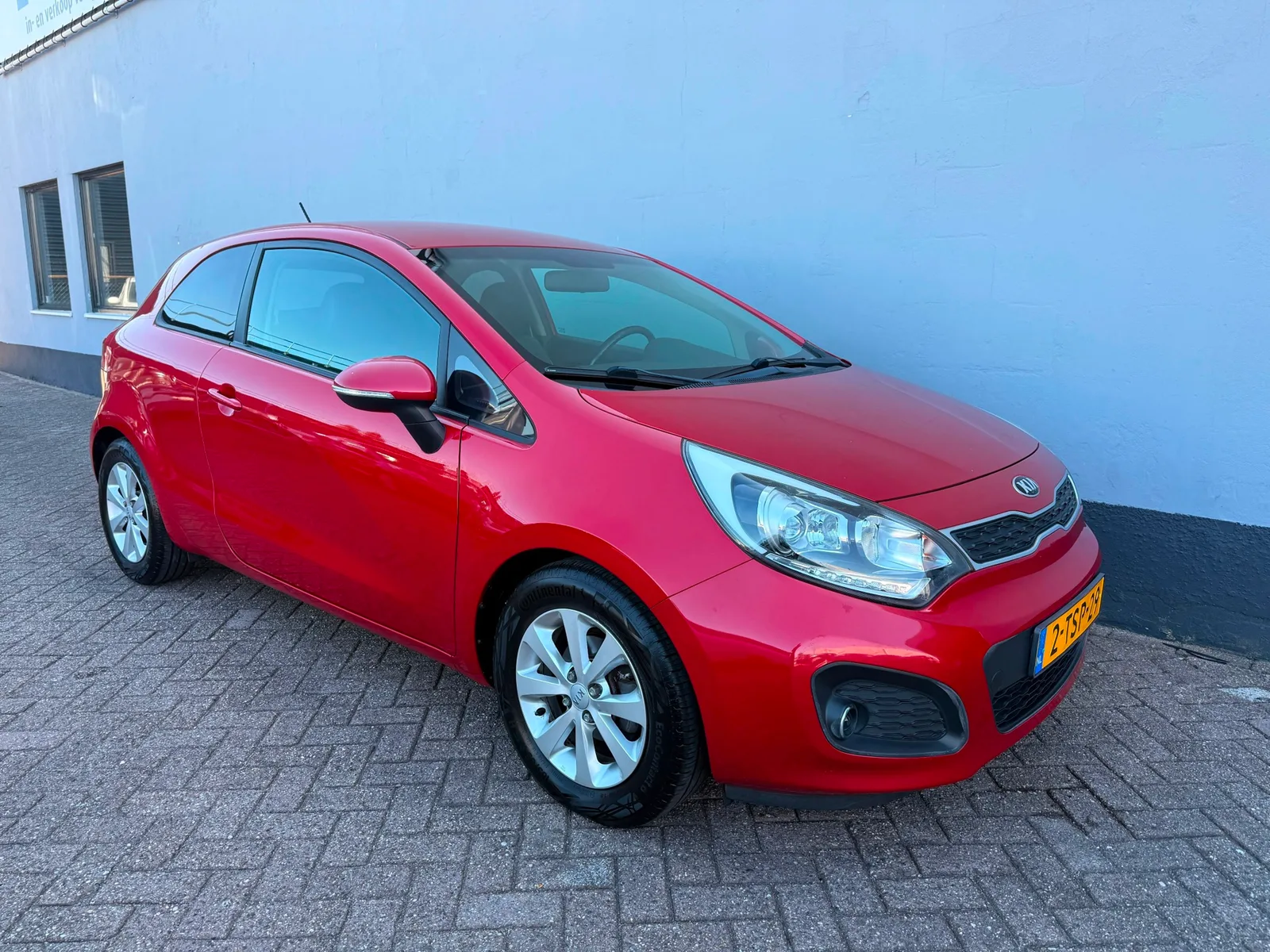 Kia Rio (2014) — foto 1