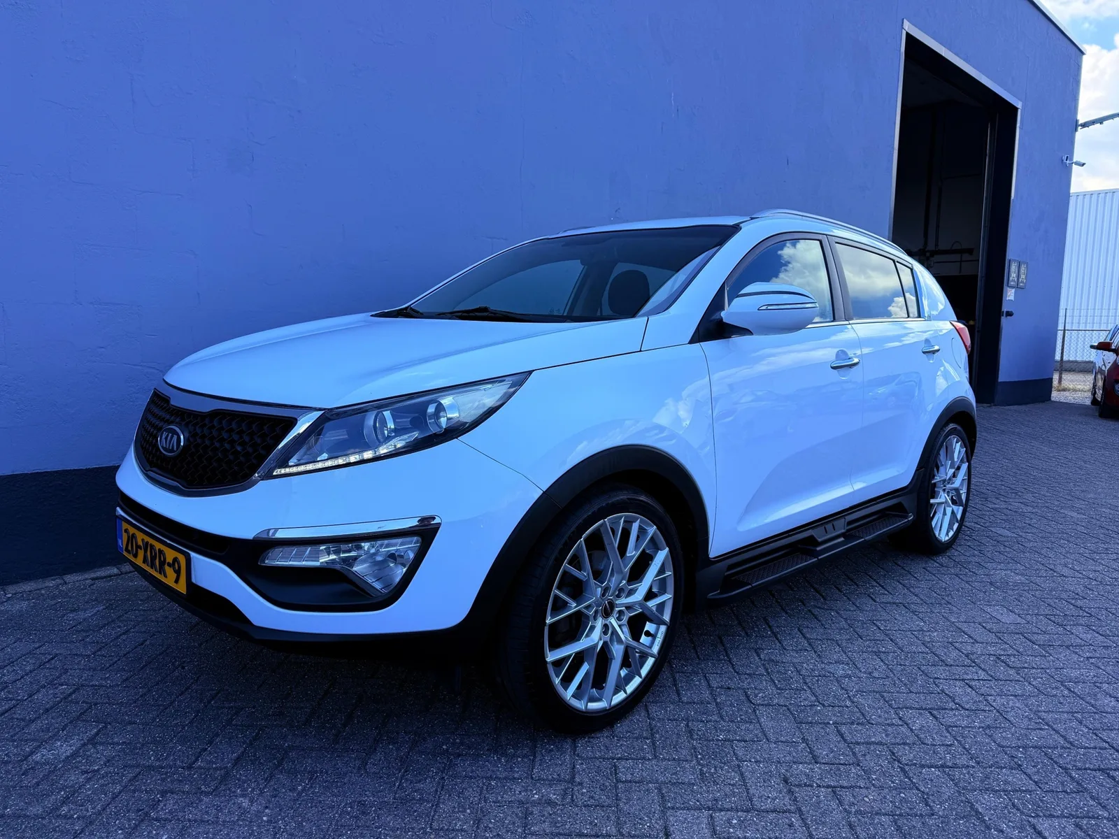 Kia Sportage (2012) — foto 1