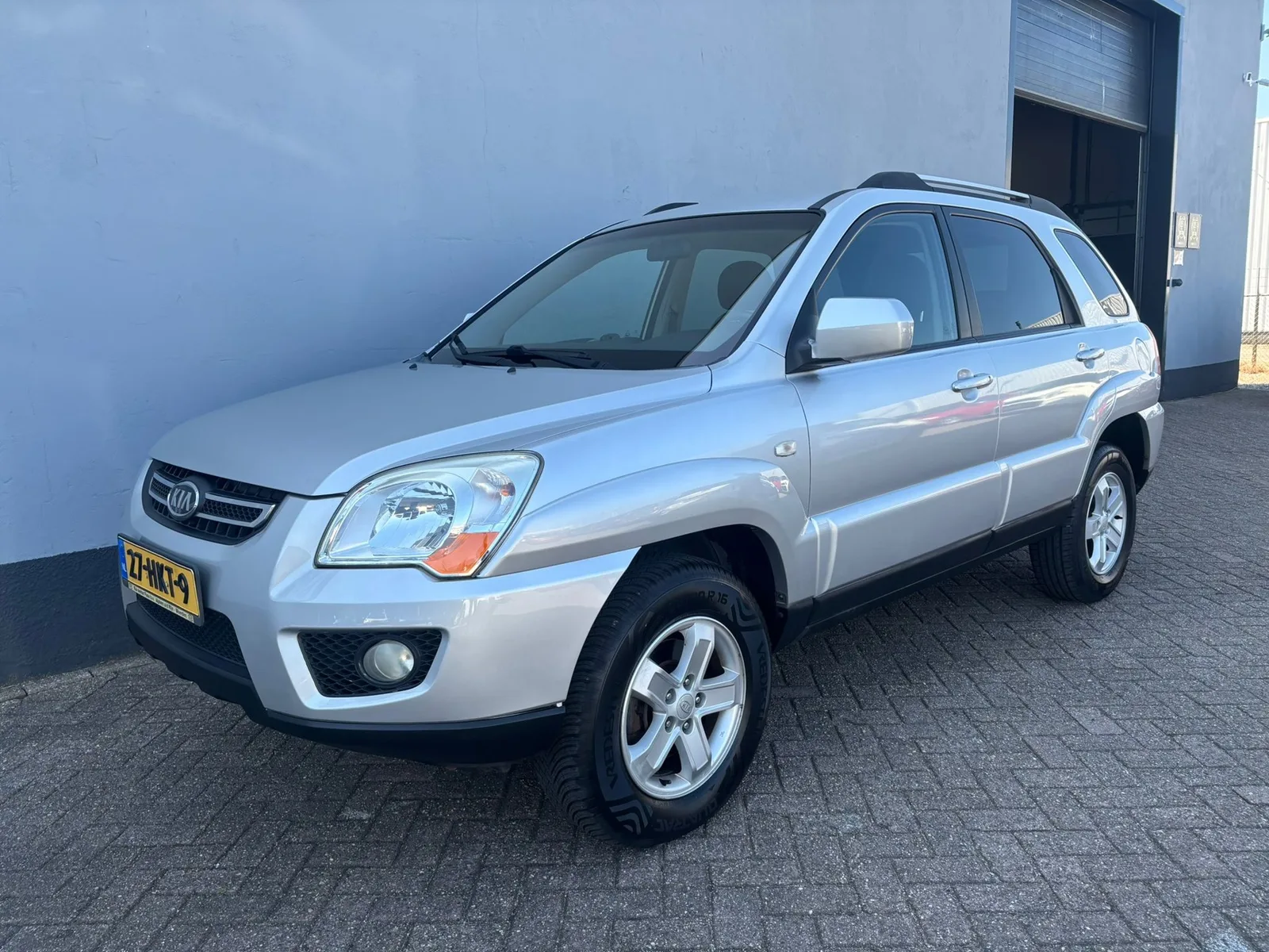 Kia Sportage (2009) — foto 1