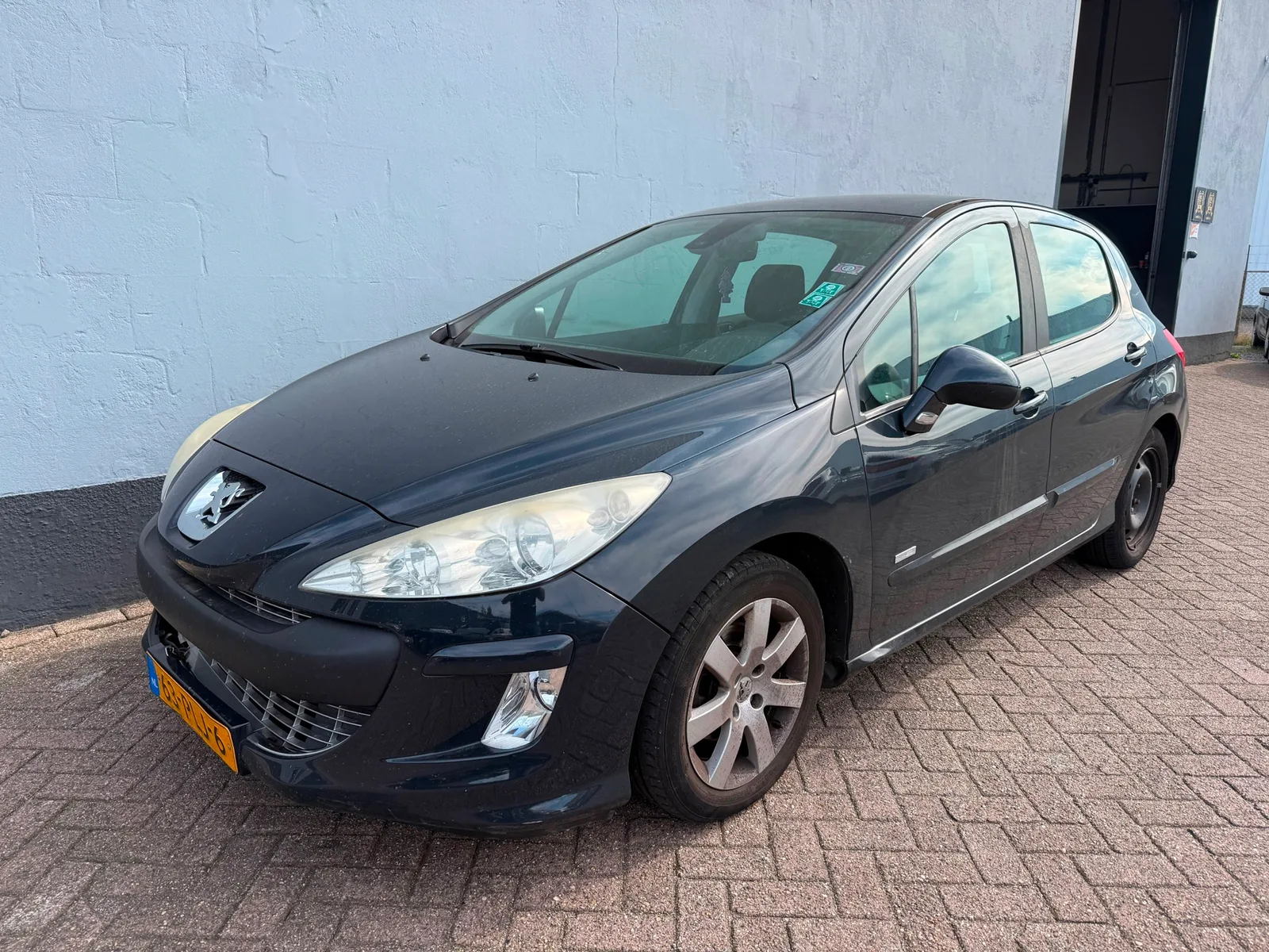 Peugeot 308 (2011) — foto 1