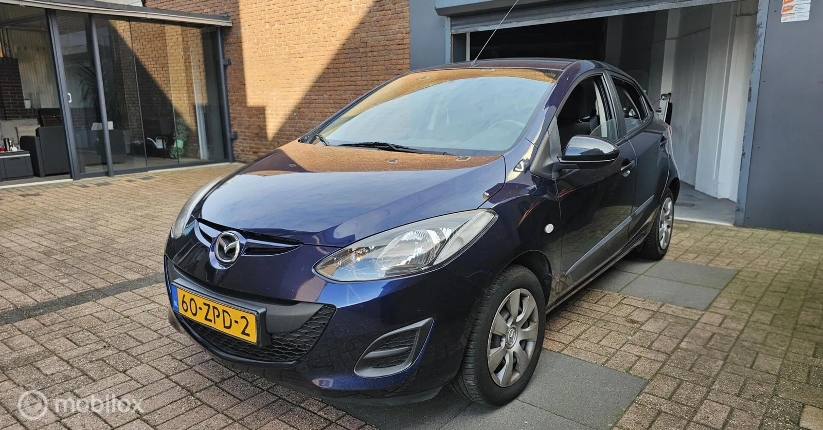 Mazda 2 (2013) — foto 1