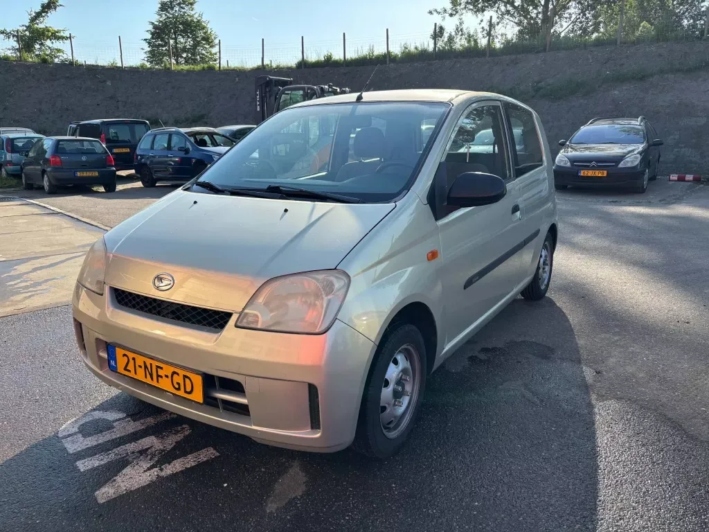 Daihatsu Cuore (2003) — foto 1