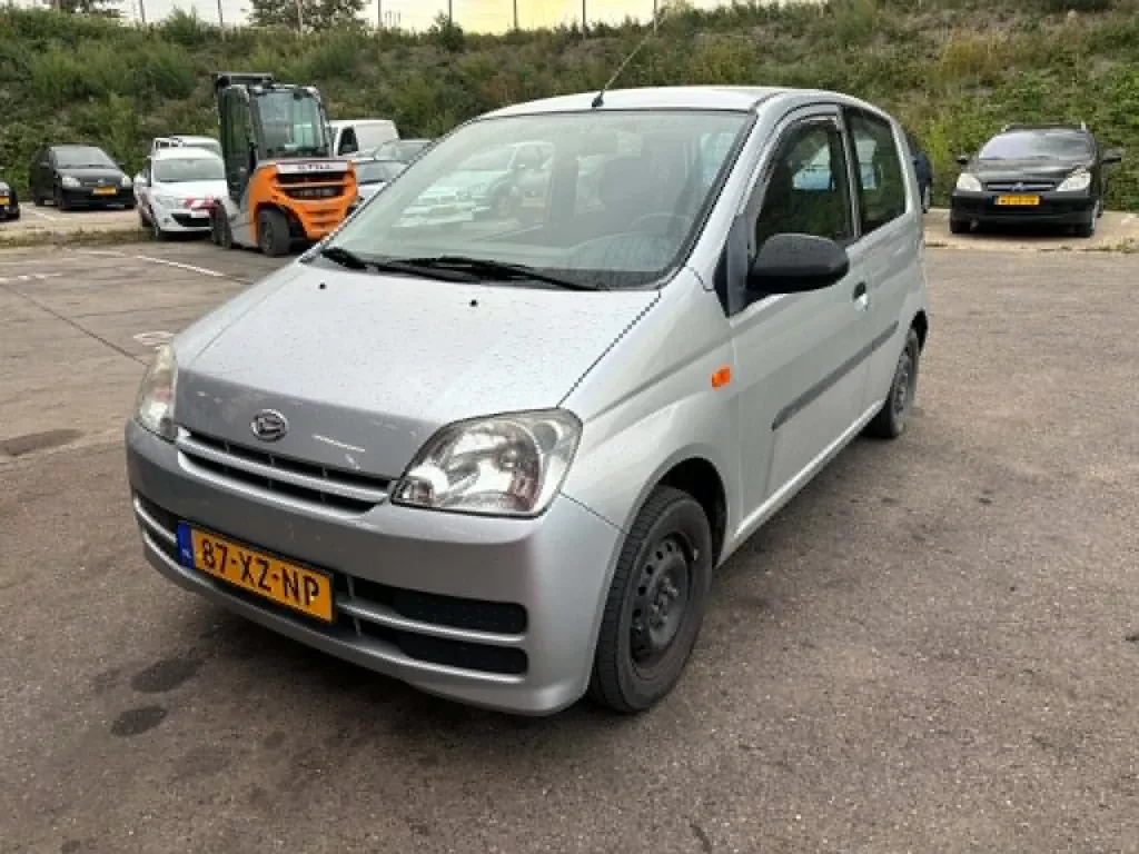 Daihatsu Cuore (2007) — foto 1