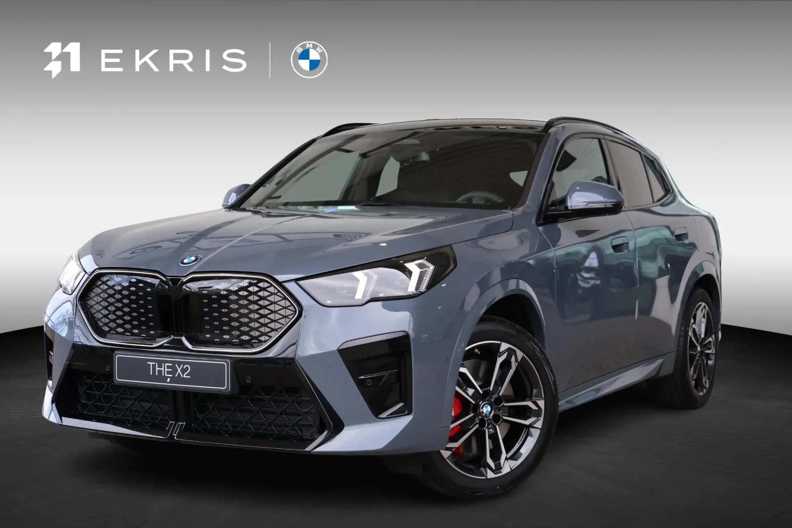BMW iX2 (2026) — foto 1