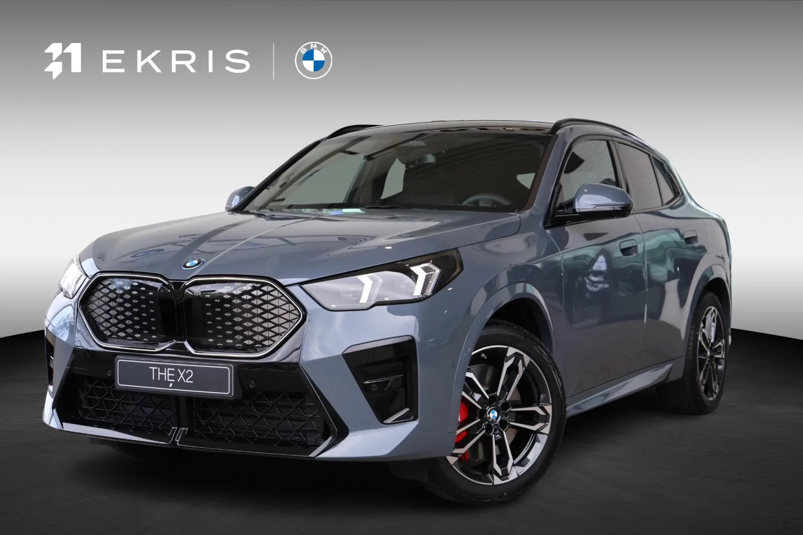 BMW iX2 (2026) — foto 1