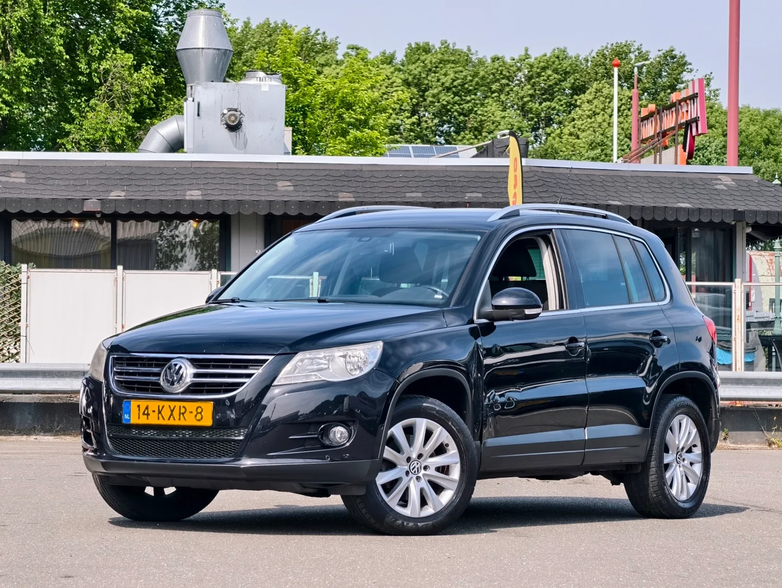 Volkswagen Tiguan (2010) — foto 1