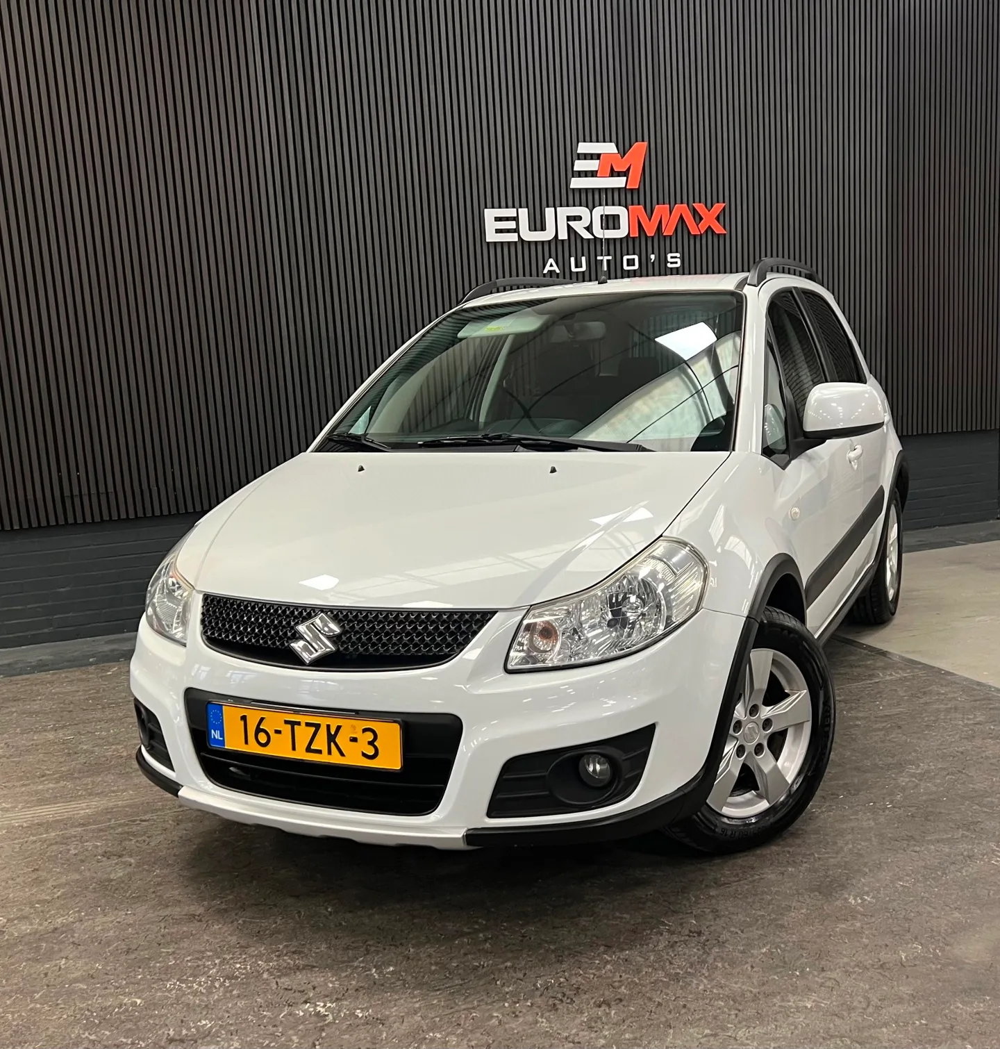 Suzuki SX4 (2012) — foto 1