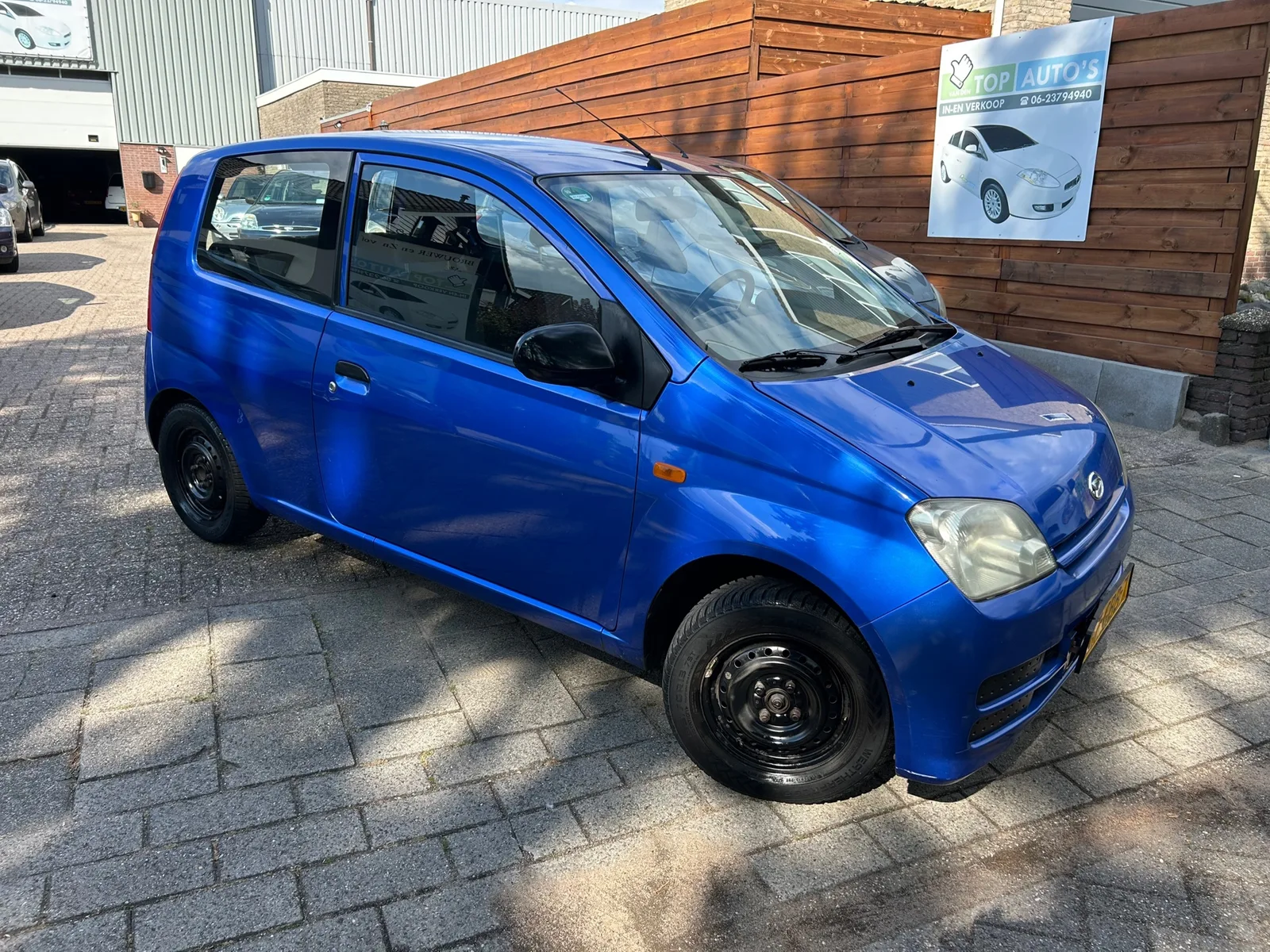 Daihatsu Cuore (2008) — foto 1