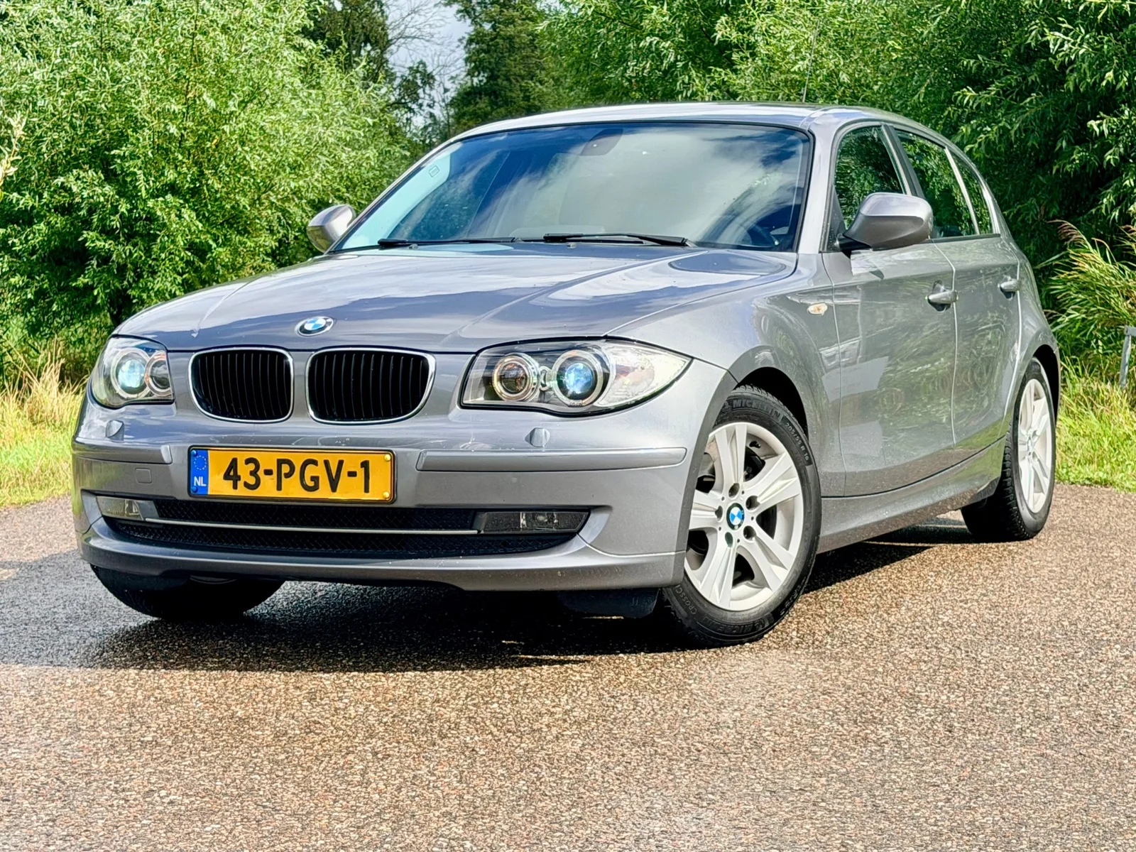 BMW 1-Serie (2011) — foto 1
