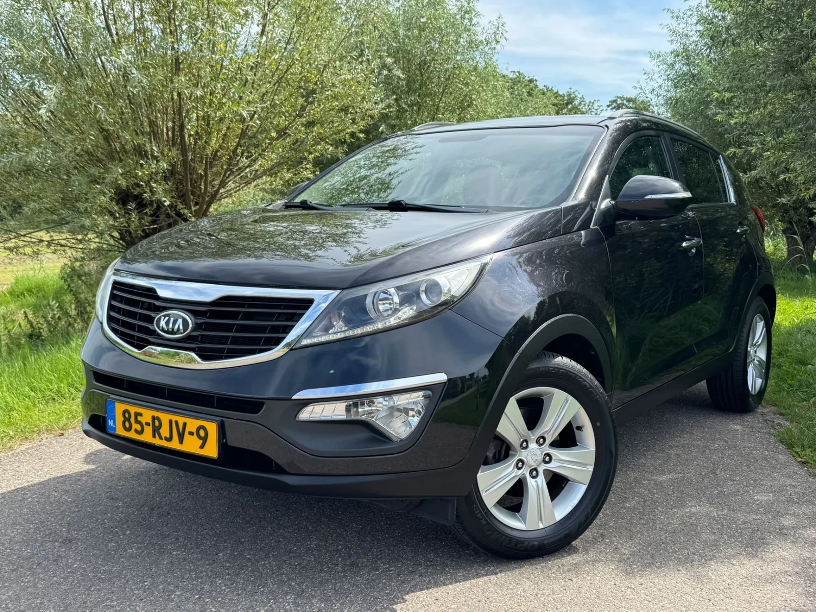 Kia Sportage (2011) — foto 1