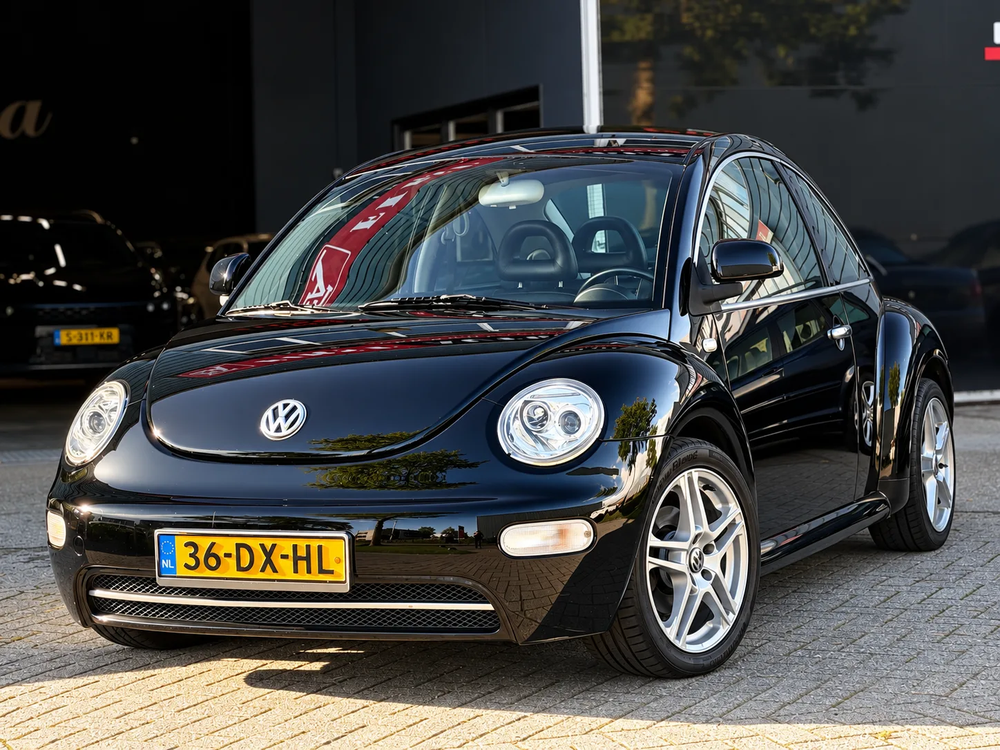 Volkswagen New Beetle (2000) — foto 1
