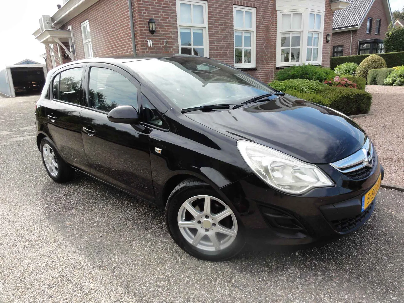 Opel Corsa (2011) — foto 1