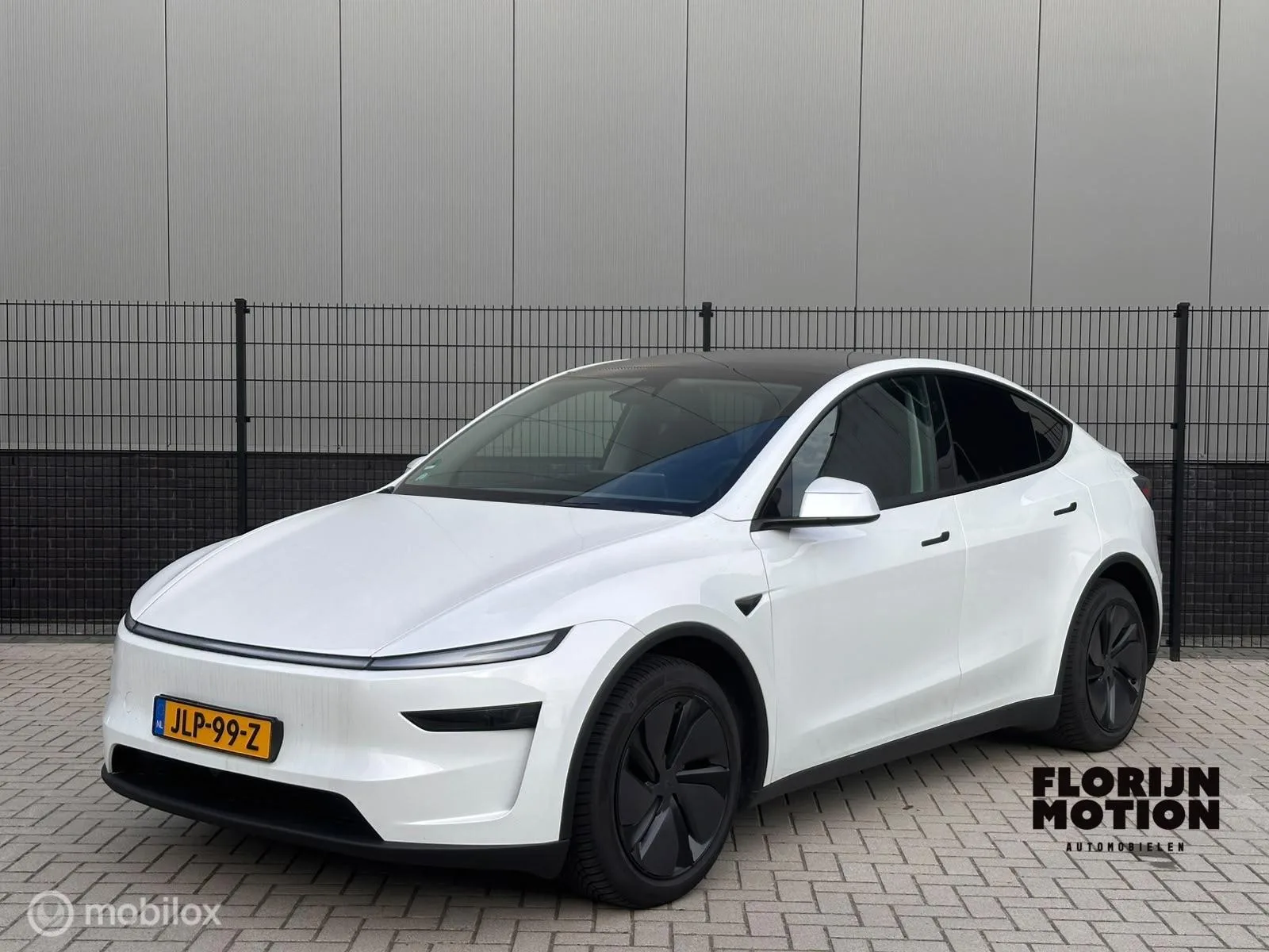 Tesla Model Y (2025) — foto 1