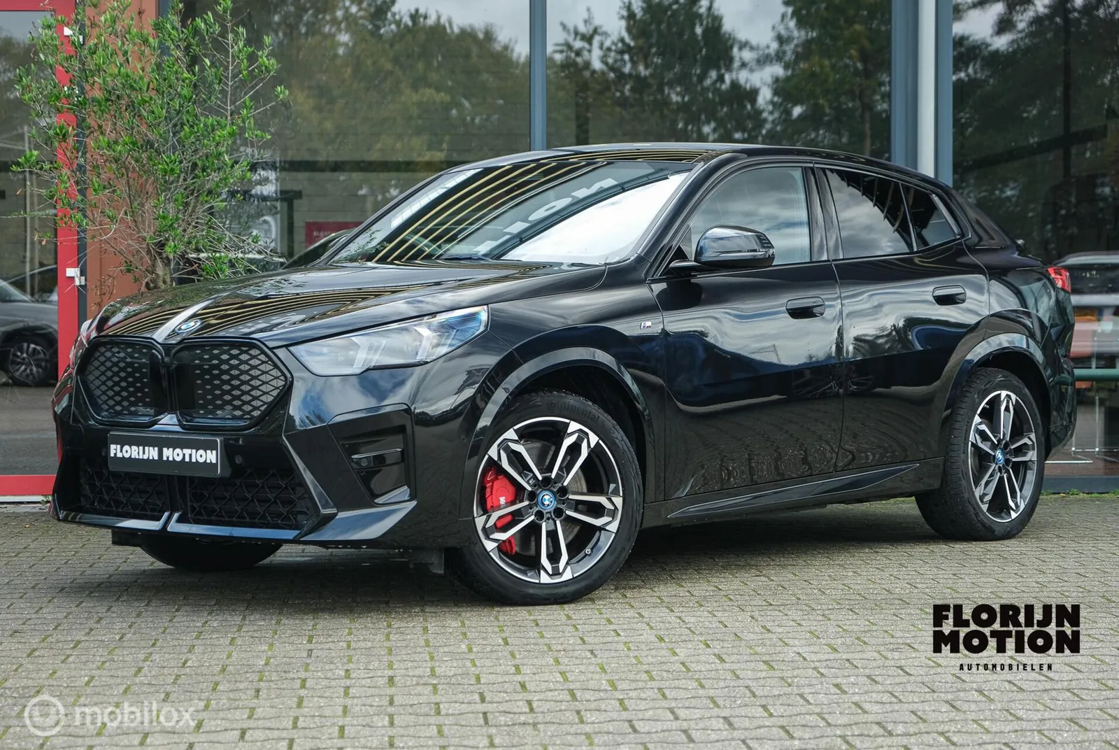 BMW iX2 (2024) — foto 1