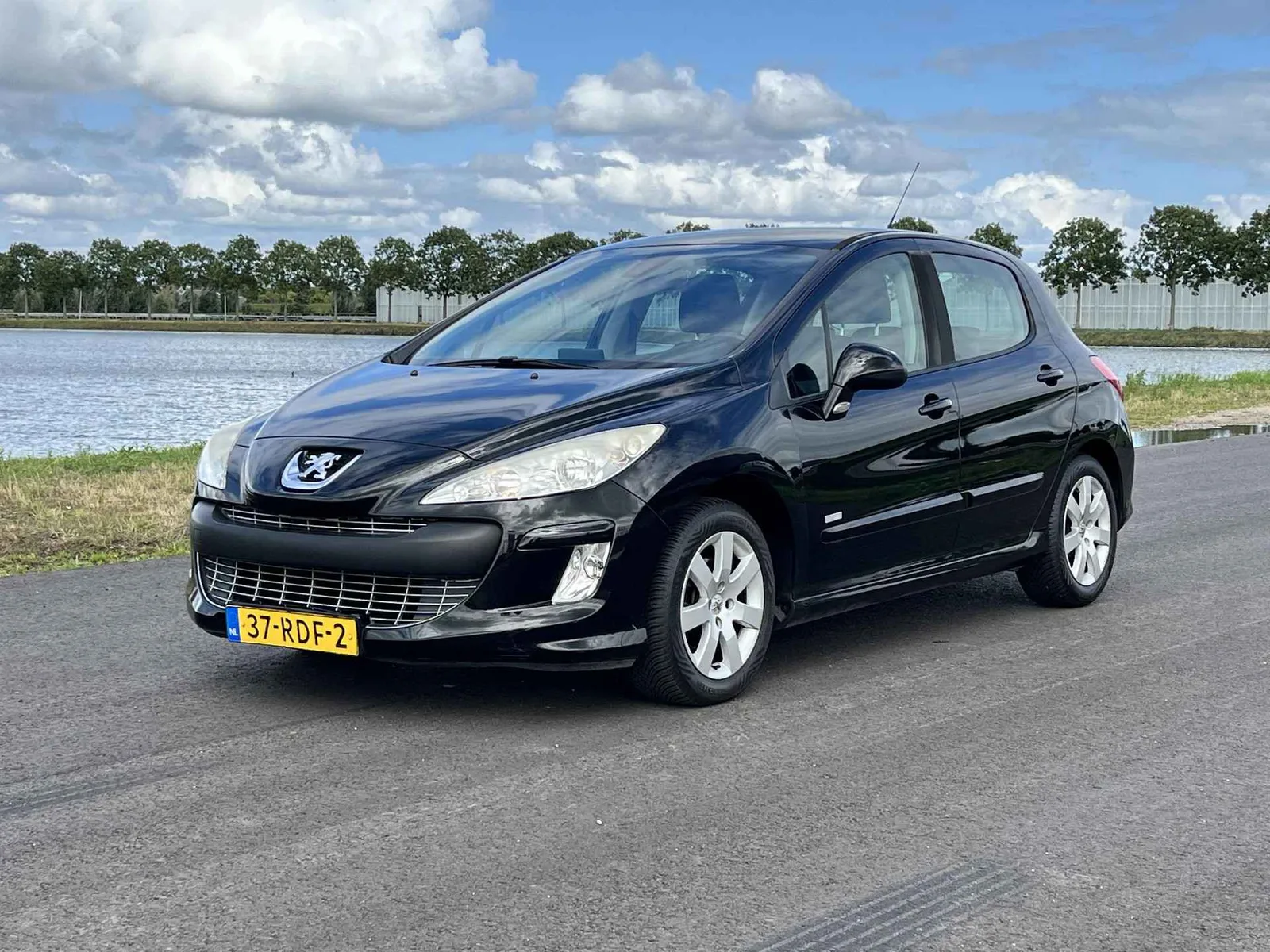 Peugeot 308 (2011) — foto 1