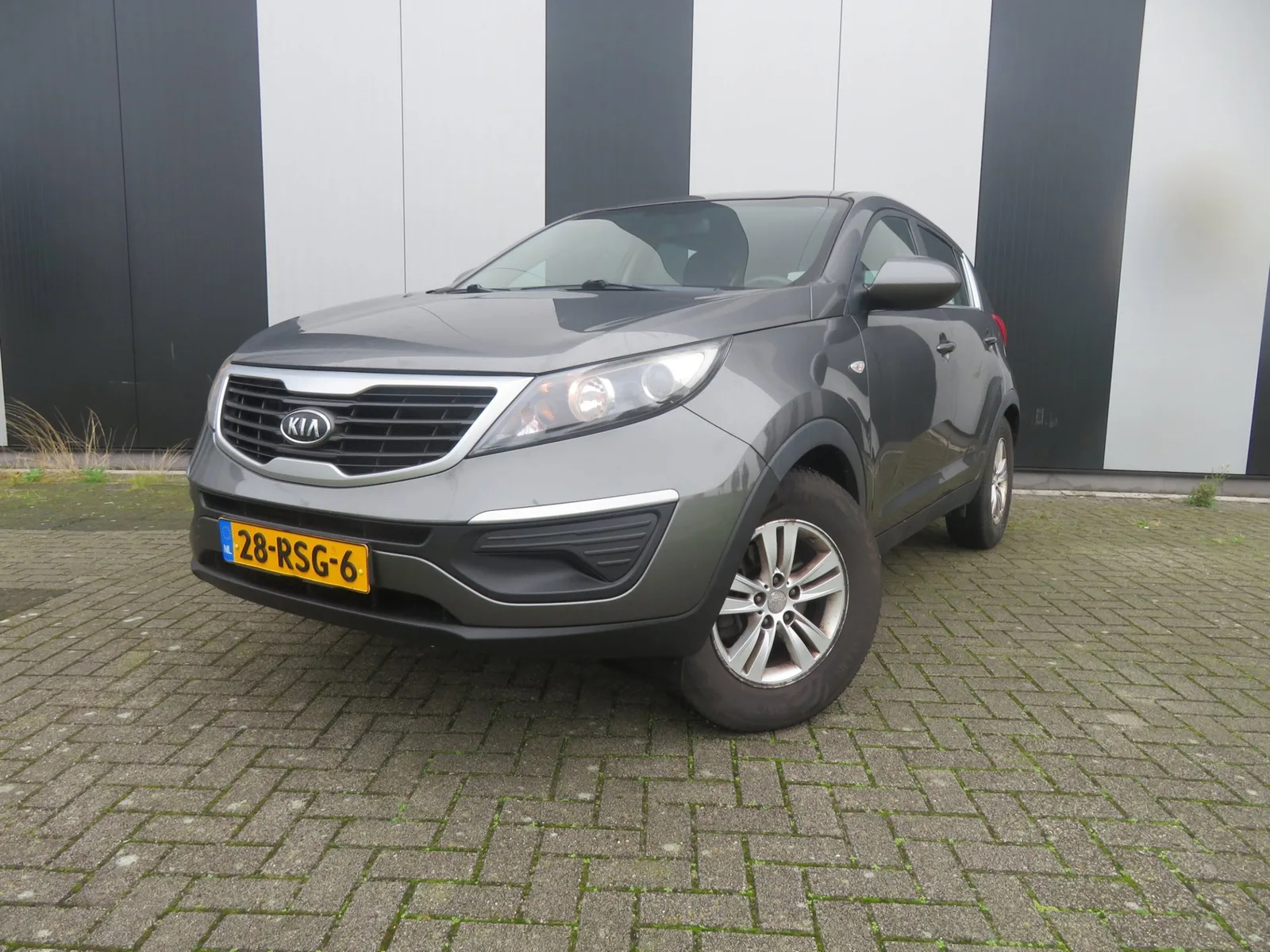 Kia Sportage (2011) — foto 1