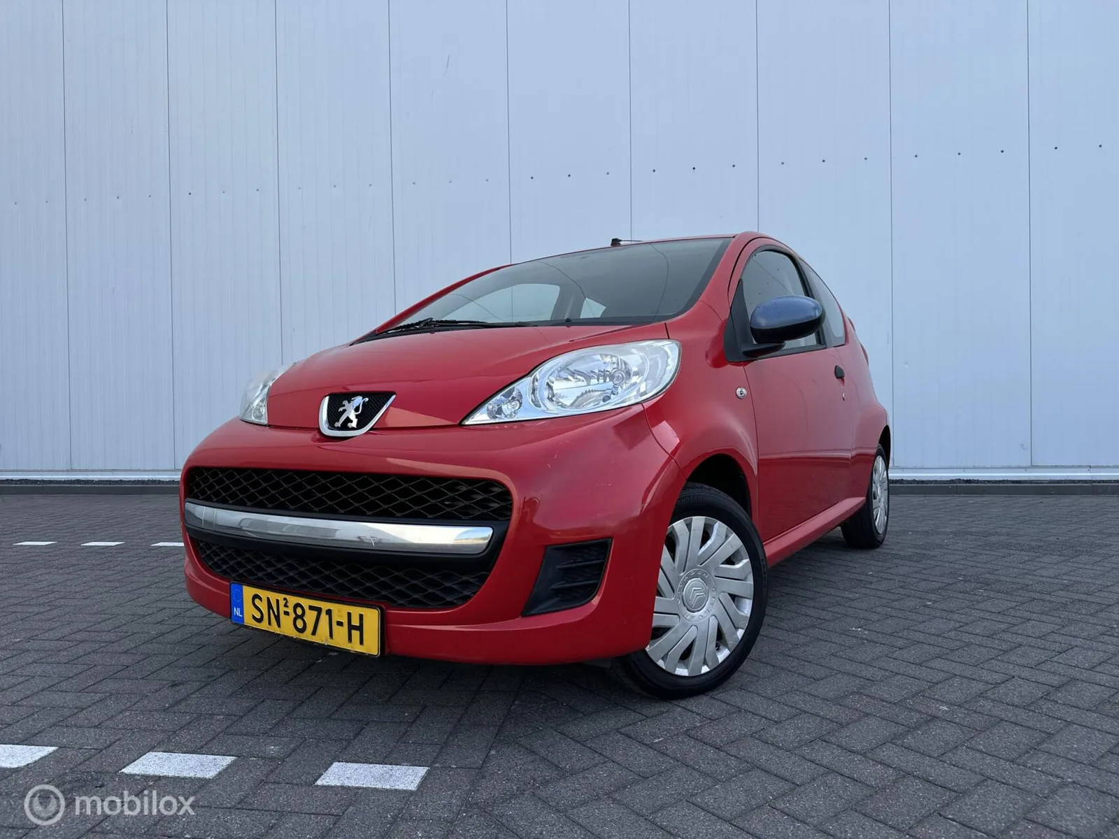 Peugeot 107 (2009) — foto 1