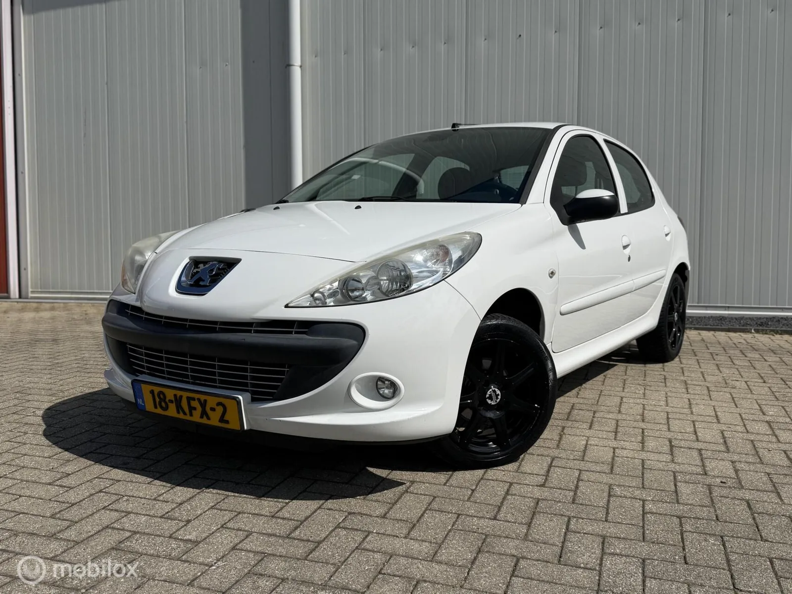 Peugeot 206 (2009) — foto 1