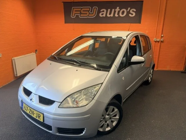 Mitsubishi Colt (2008) — foto 1