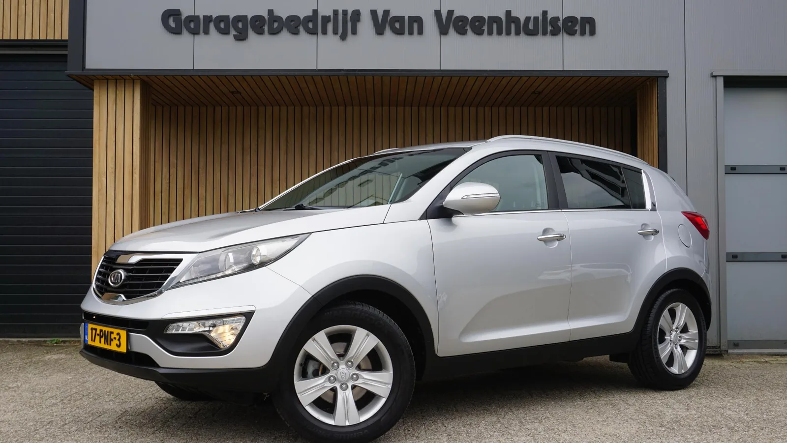 Kia Sportage (2011) — foto 1
