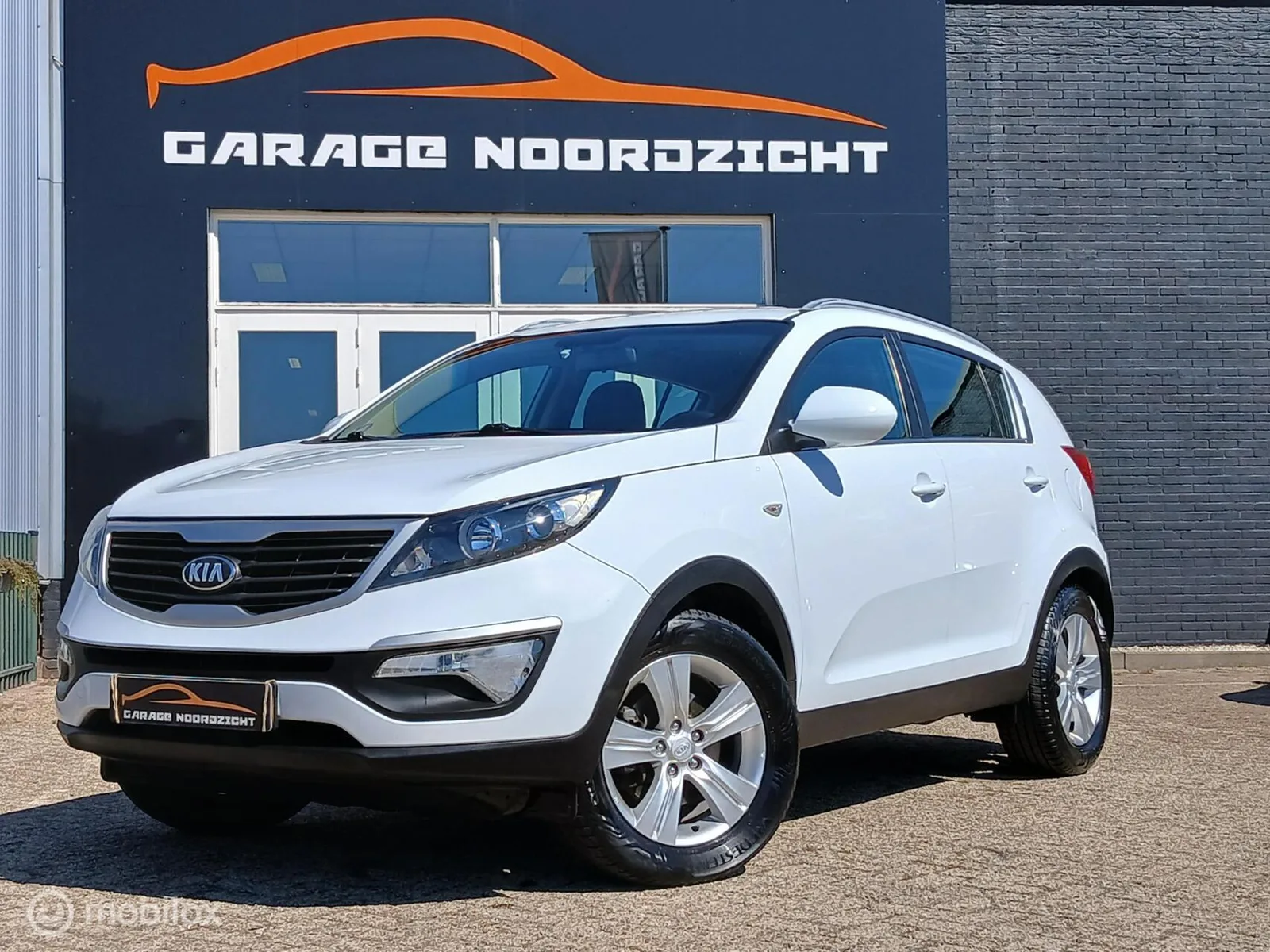Kia Sportage (2014) — foto 1