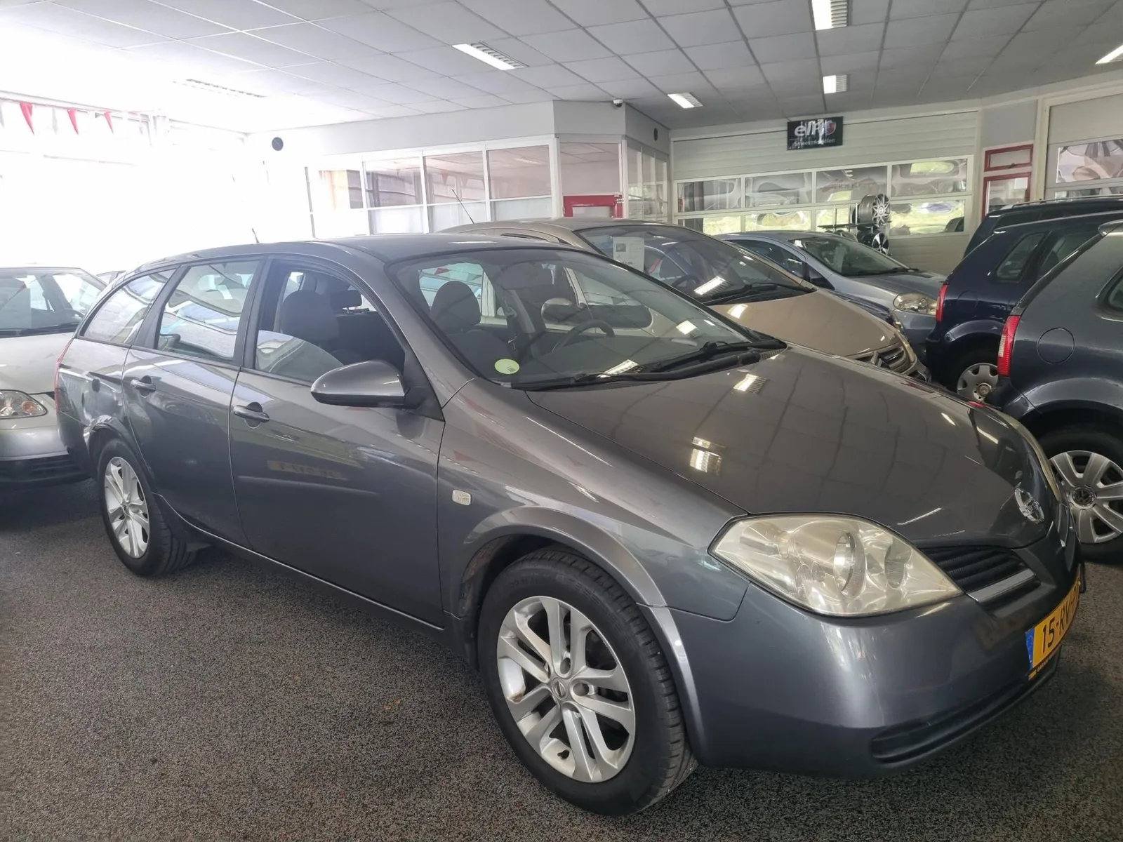Nissan Primera (2005) — foto 1