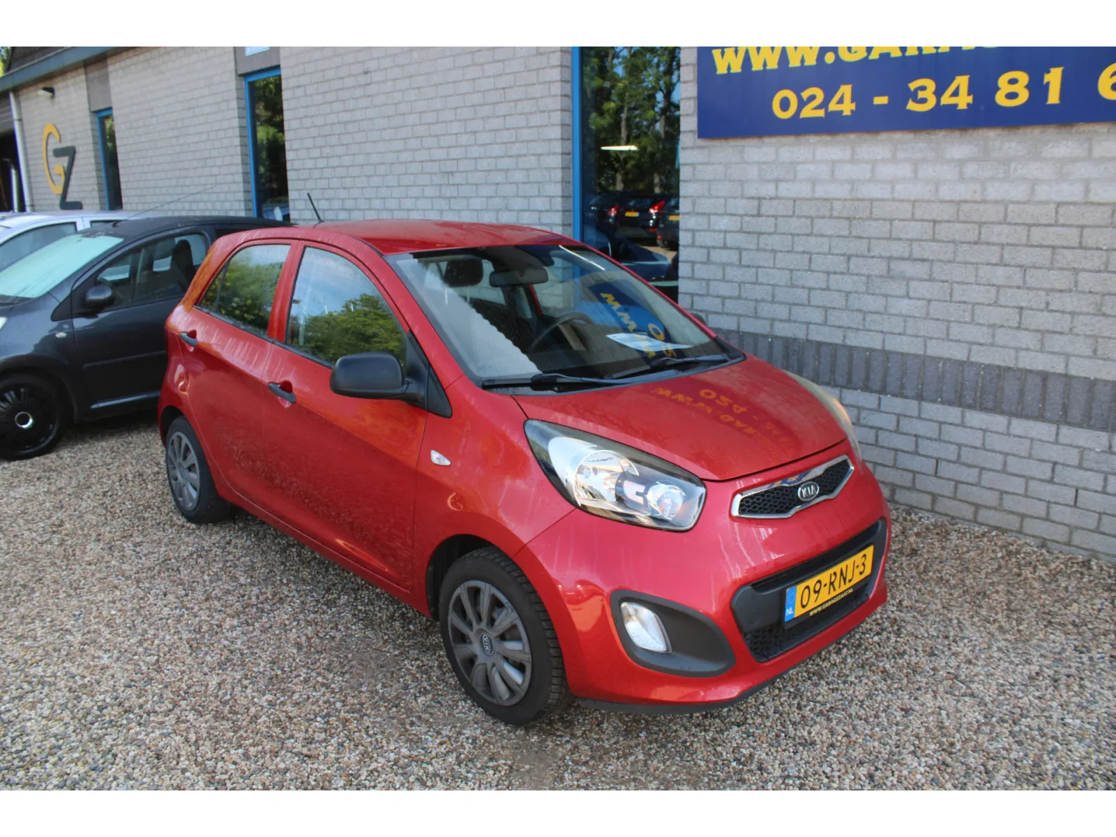 Kia Picanto (2011) — foto 1