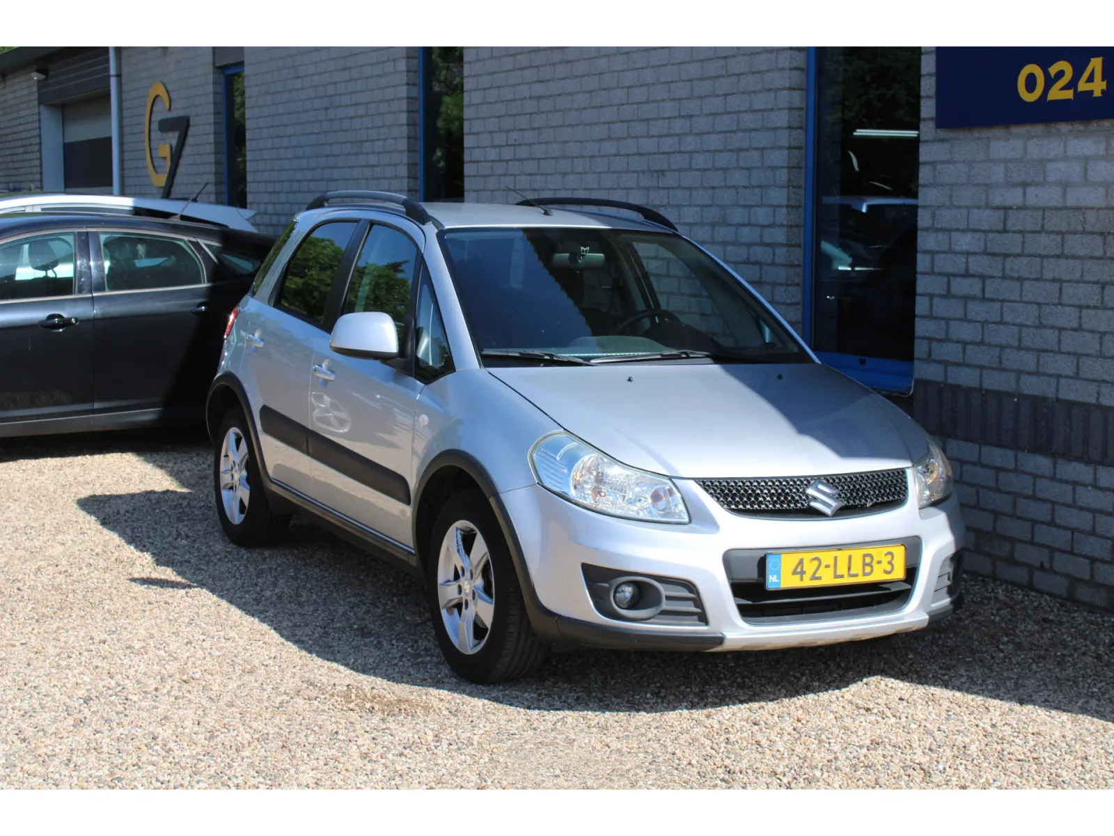 Suzuki SX4 (2010) — foto 1