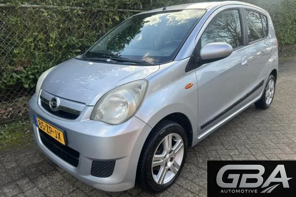 Daihatsu Cuore (2008) — foto 1