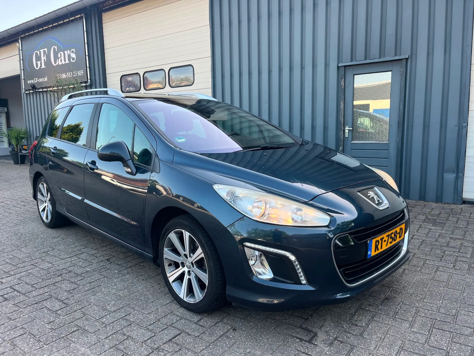 Peugeot 308 (2011) — foto 1